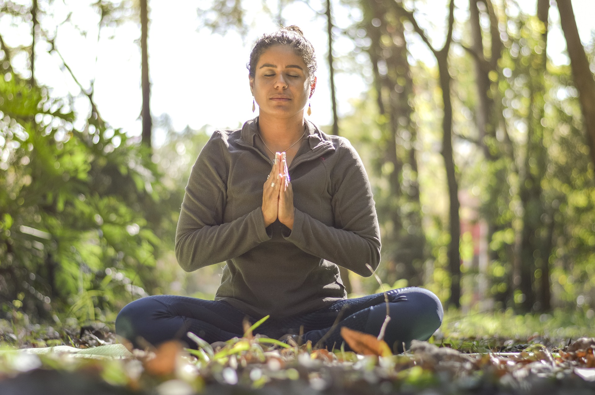 Woman doing yoga A woman does yoga on a wellness retreat.