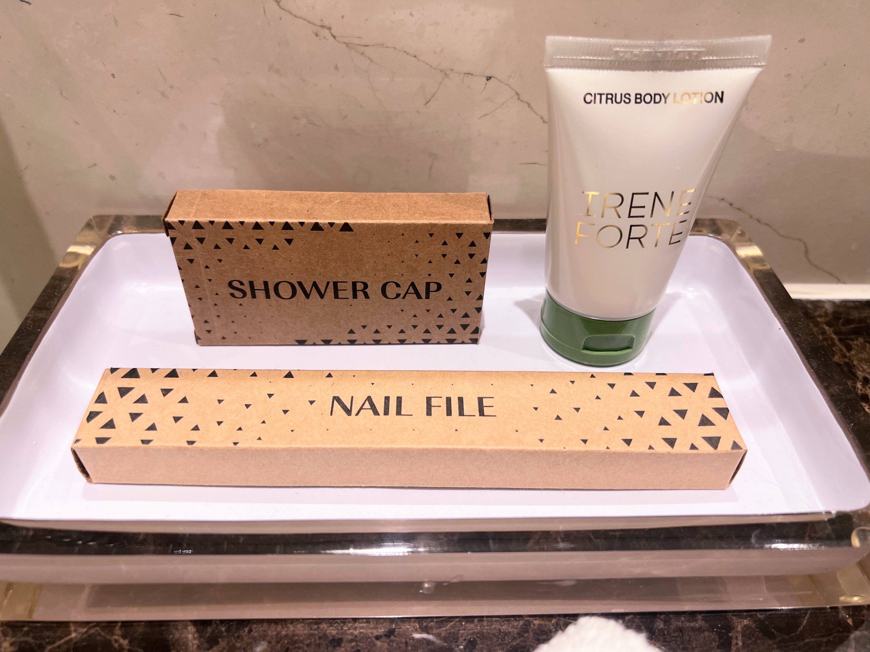 Bathroom amenities by sink at The Charles Hotel in Munich Bathroom amenities by sink at The Charles Hotel in Munich