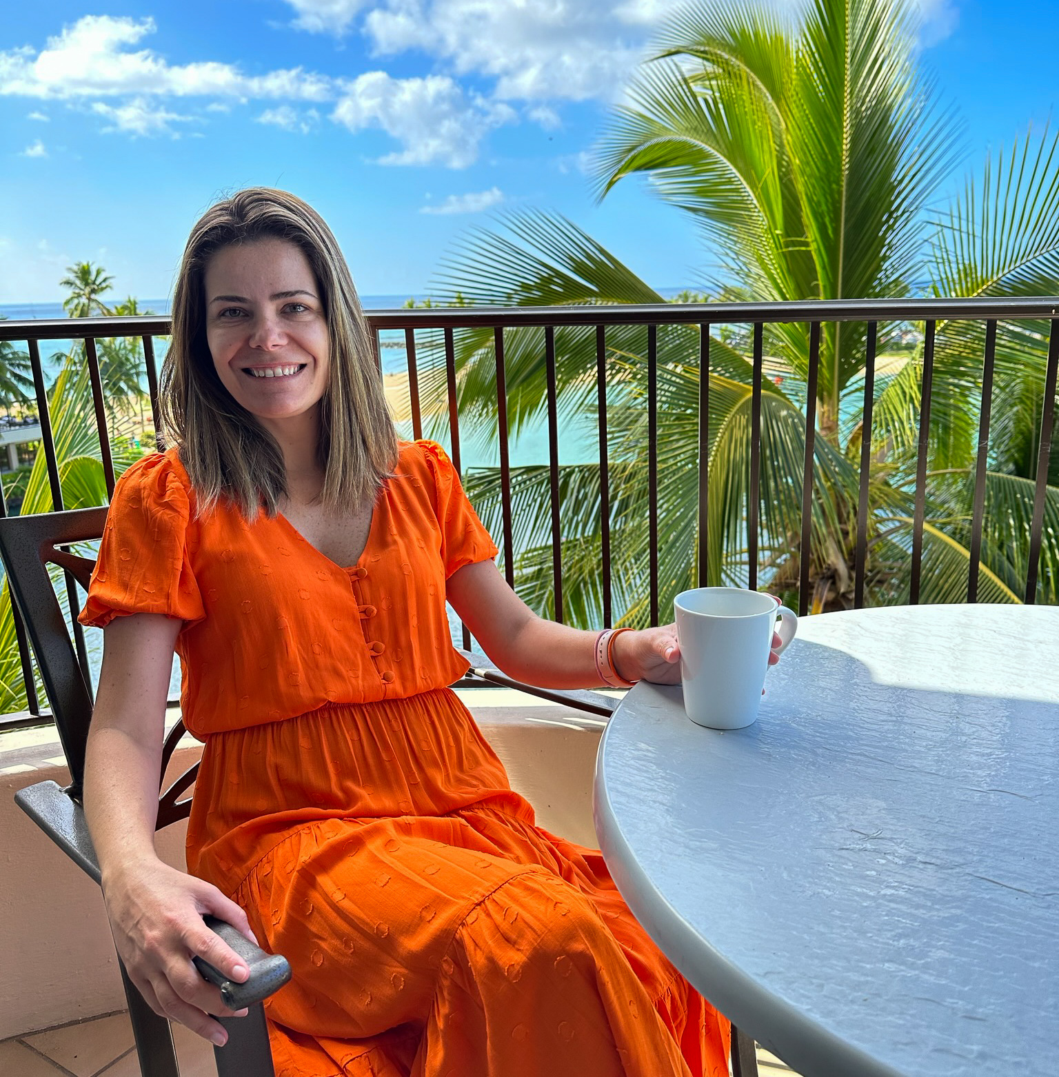 Hilton Hawaiian Village woman on balcony
