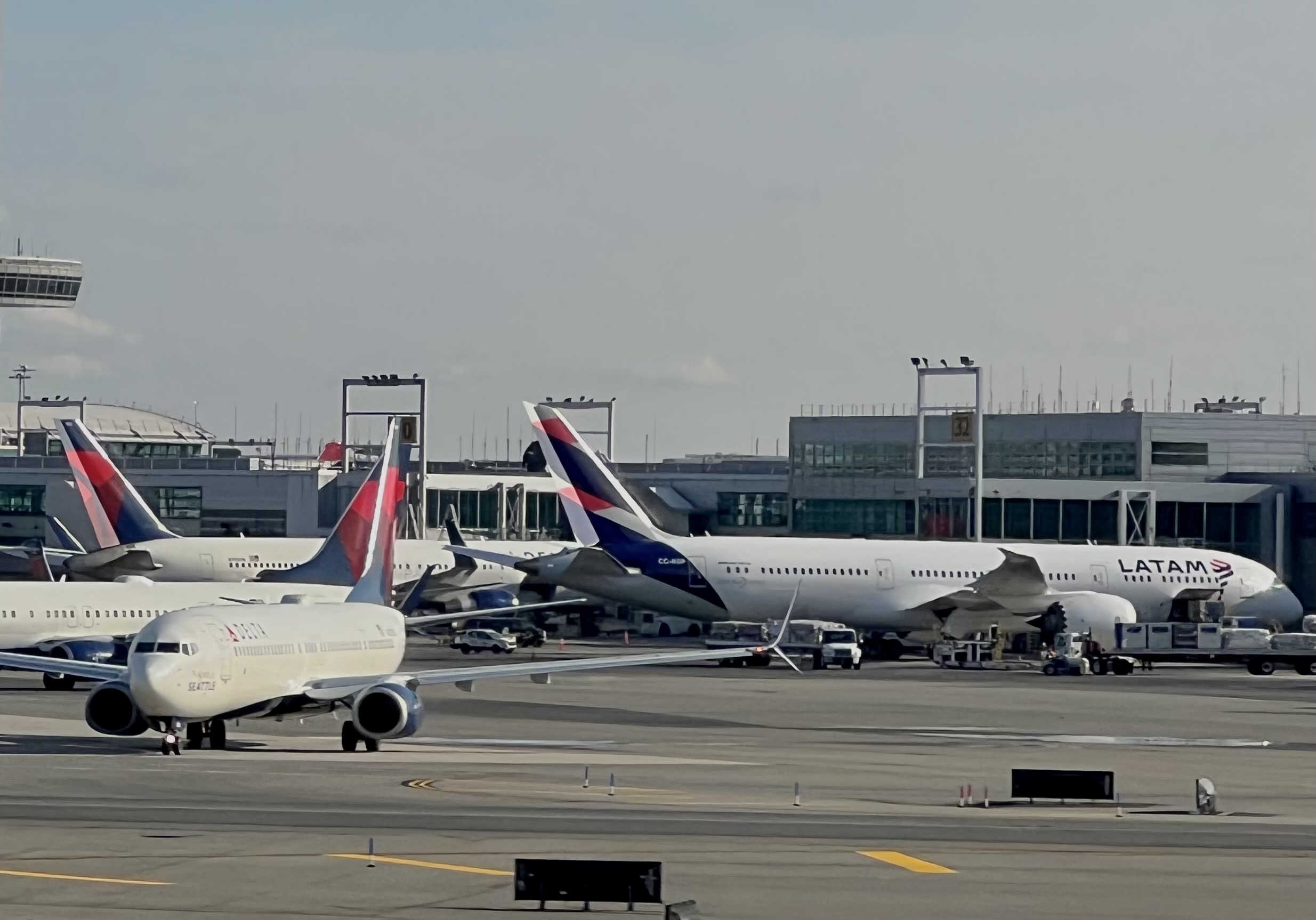 Delta LATAM tailfins LATAM and Delta jets at JFK
