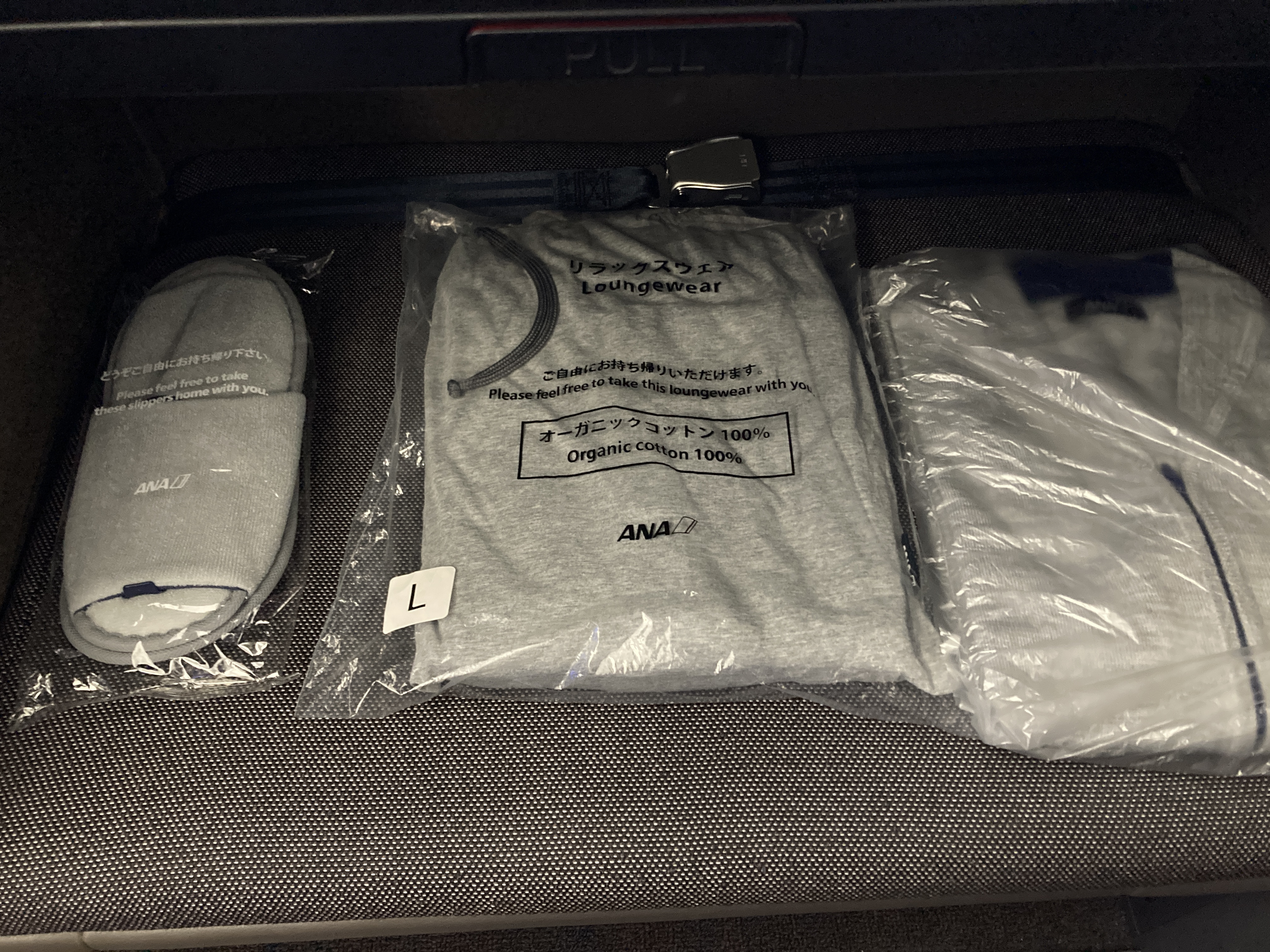ANA new first class suites HND SFO Boeing 777 pajamas slippers