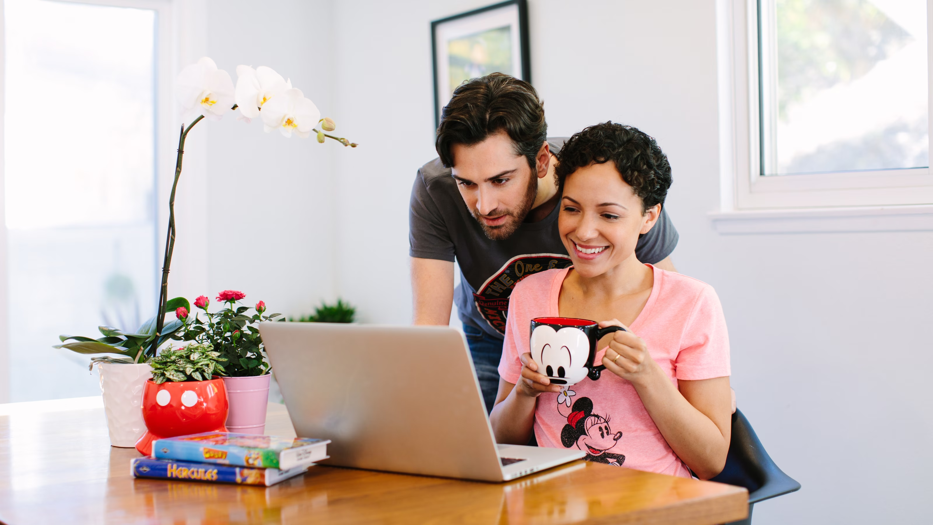 Disney Couple Applying for DAS on laptop Disney Couple Applying for DAS on laptop