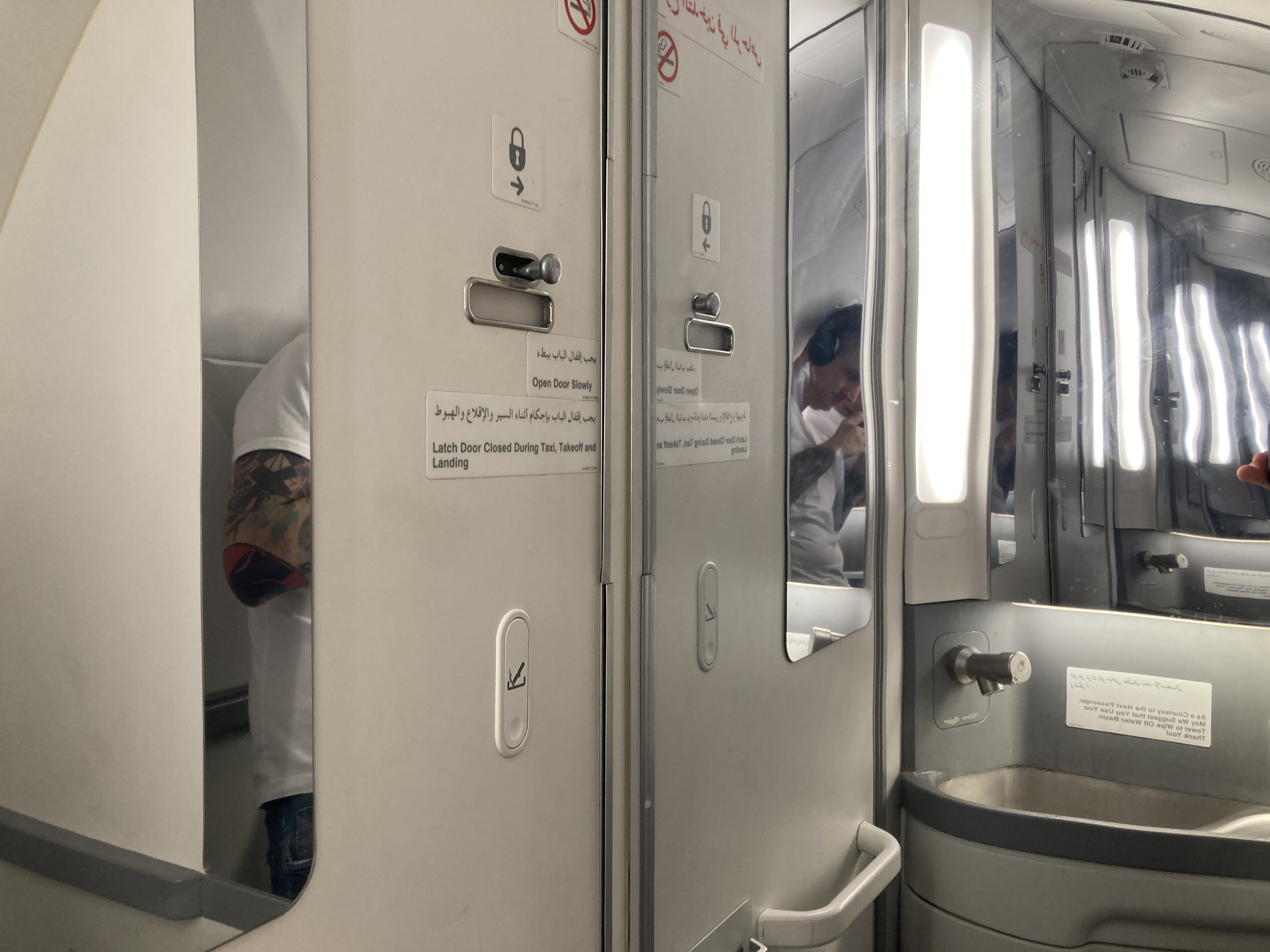 Royal Air Maroc Boeing 737 MAX 8 business class LHR CMN bathroom mirrors door Royal Air Maroc Boeing 737 MAX 8 business class LHR CMN bathroom mirrors door