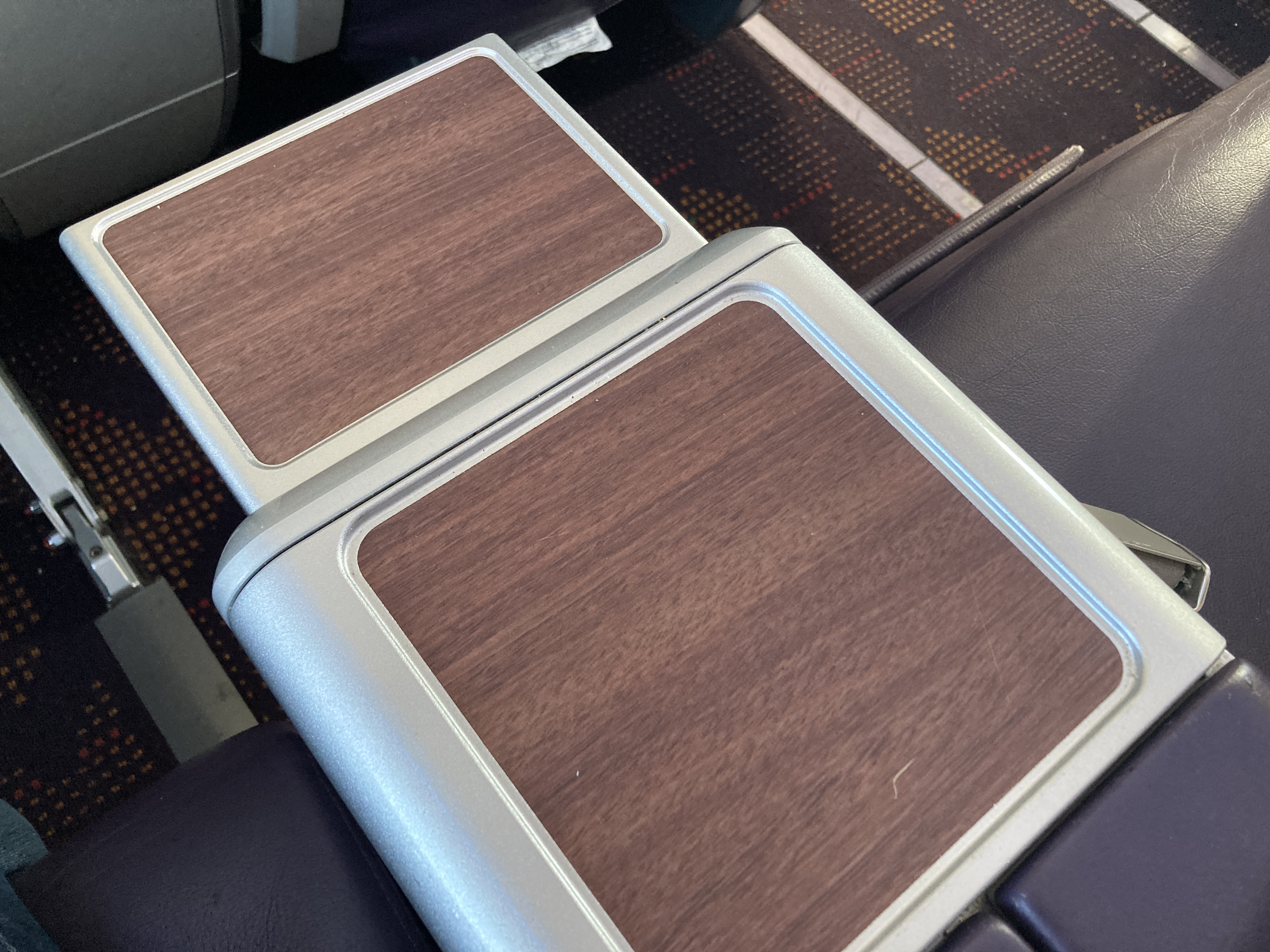 Royal Air Maroc Boeing 737 MAX 8 business class LHR CMN middle arm rest drink holder extended Royal Air Maroc Boeing 737 MAX 8 business class LHR CMN middle arm rest drink holder extended