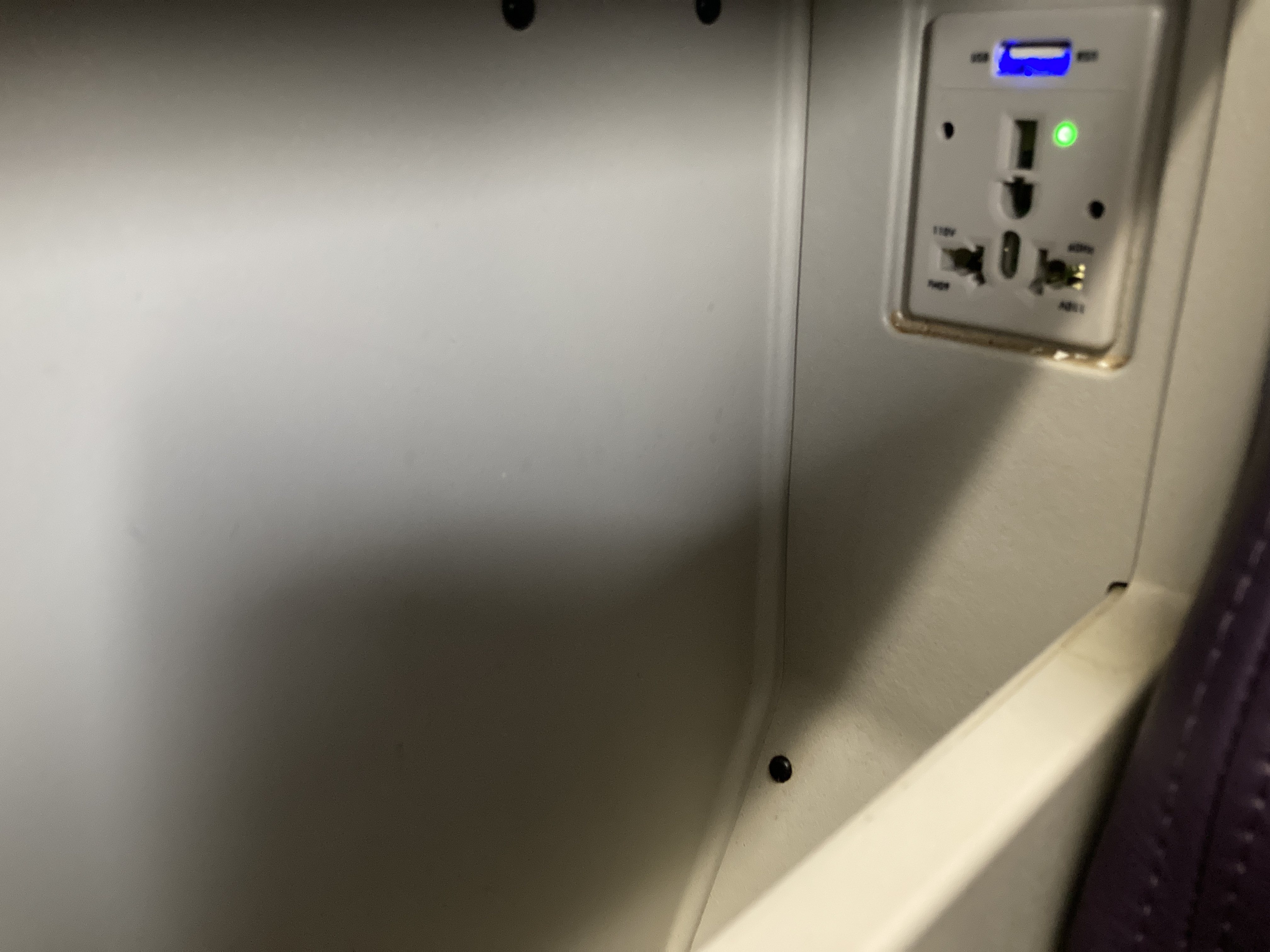 Royal Air Maroc Boeing 737 MAX 8 business class LHR CMN outlet in middle arm rest Royal Air Maroc Boeing 737 MAX 8 business class LHR CMN outlet in middle arm rest