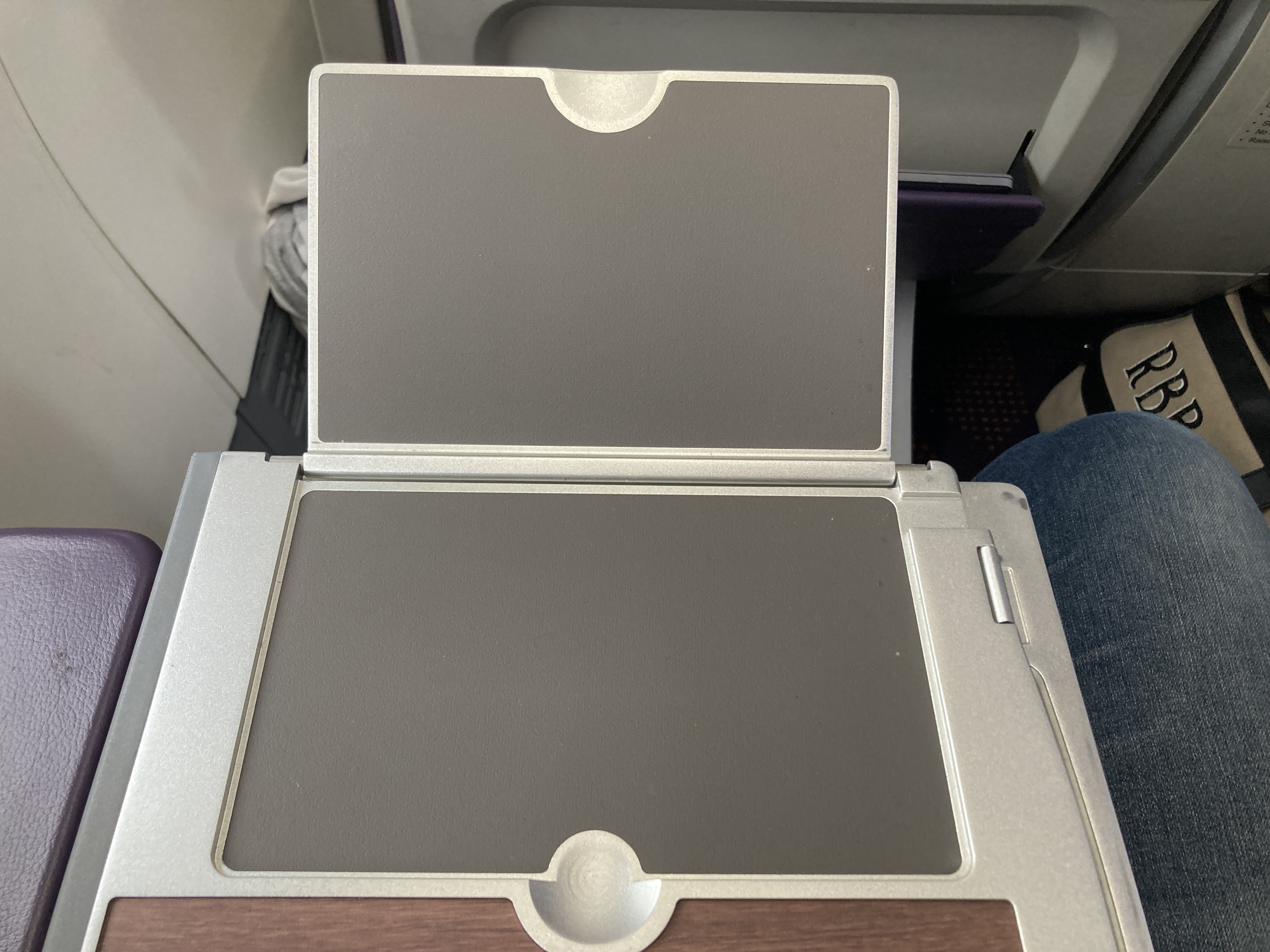 Royal Air Maroc Boeing 737 MAX 8 business class LHR CMN tray table unfolded front Royal Air Maroc Boeing 737 MAX 8 business class LHR CMN tray table unfolded front