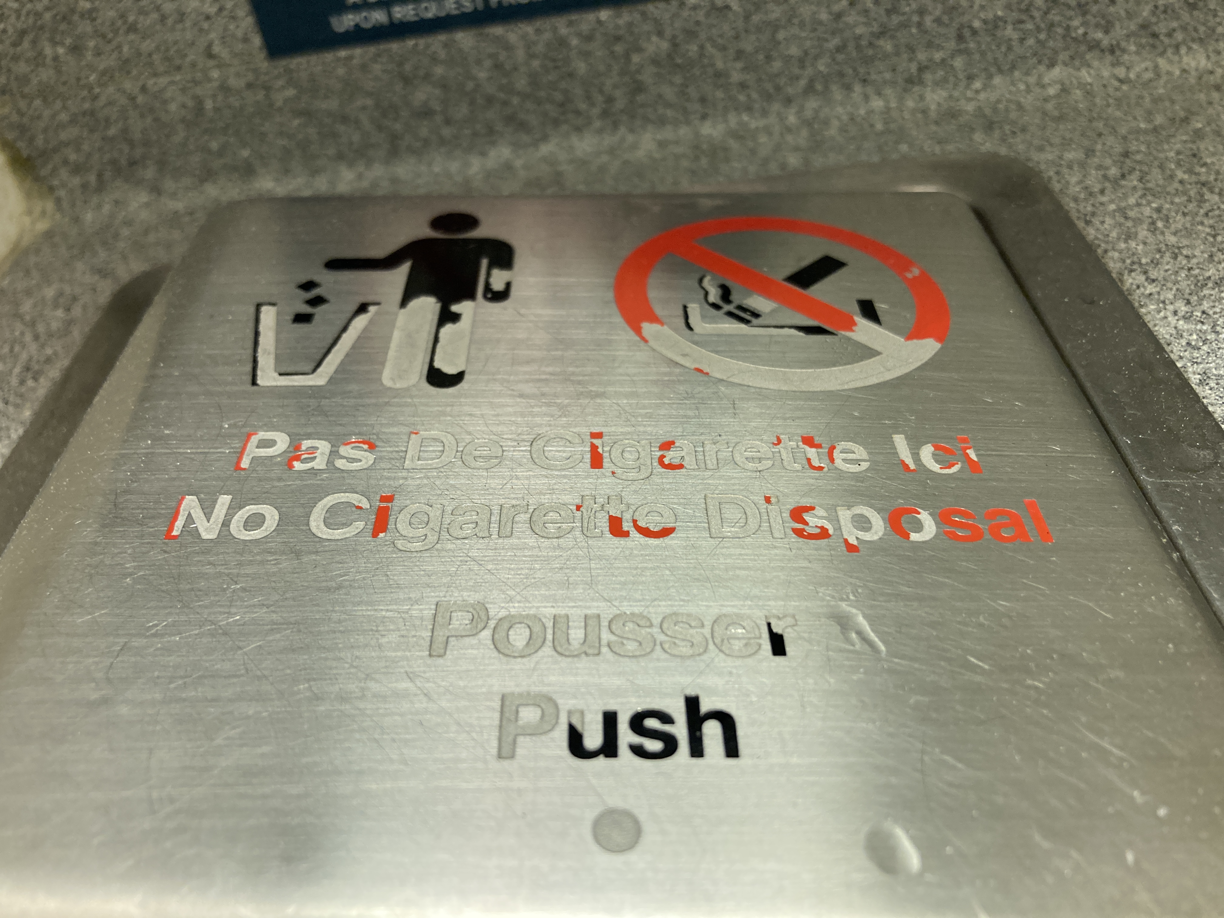Air France Boeing 777 200 CDG JFK premium economy lavatory worn trash bin lid