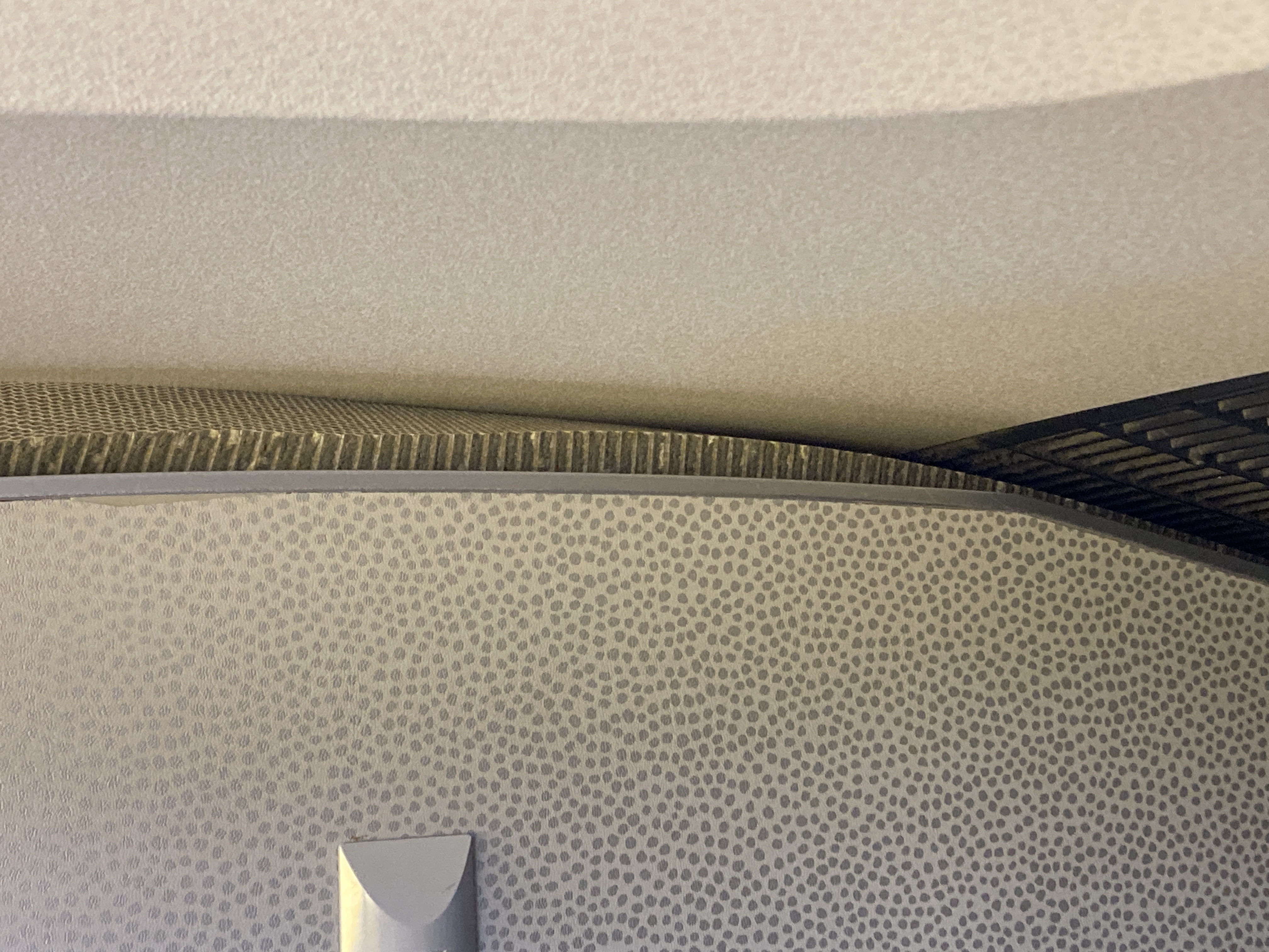 Air France Boeing 777 200 CDG JFK premium economy loose insulation around lavatory