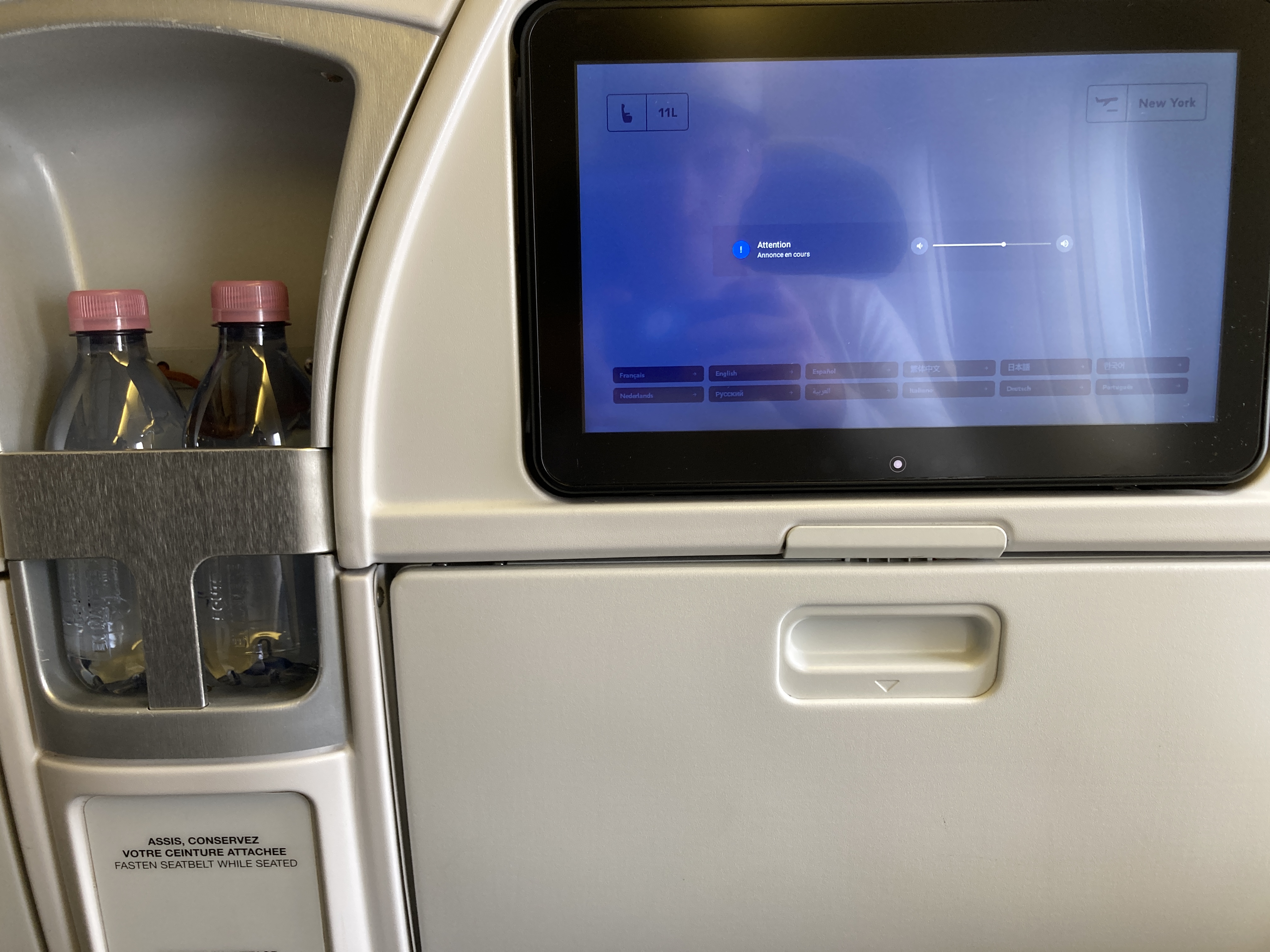 Air France Boeing 777 200 CDG JFK premium economy seat back with screen and water 