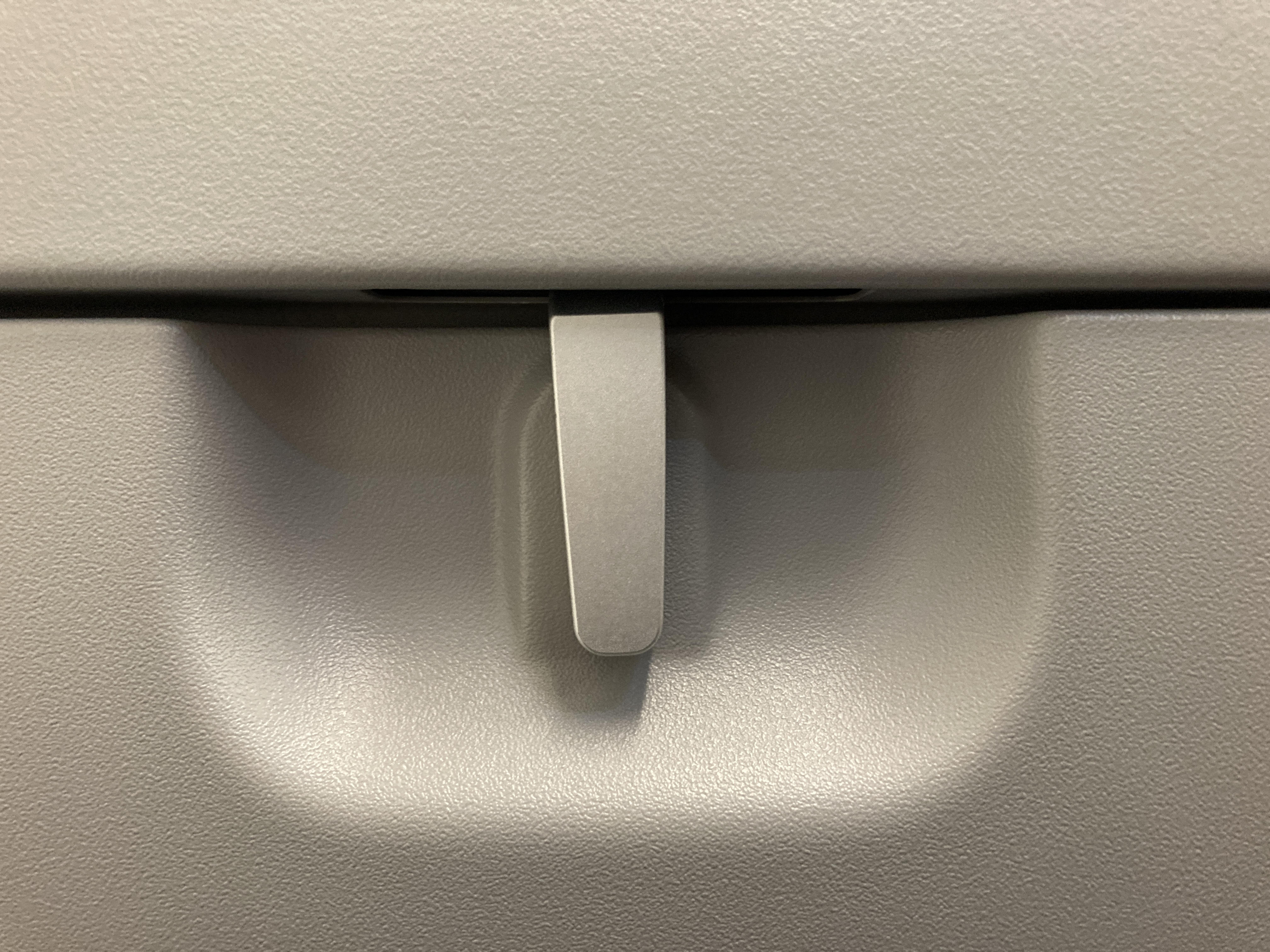 Avianca economy A320 LAX SAL tray table latch