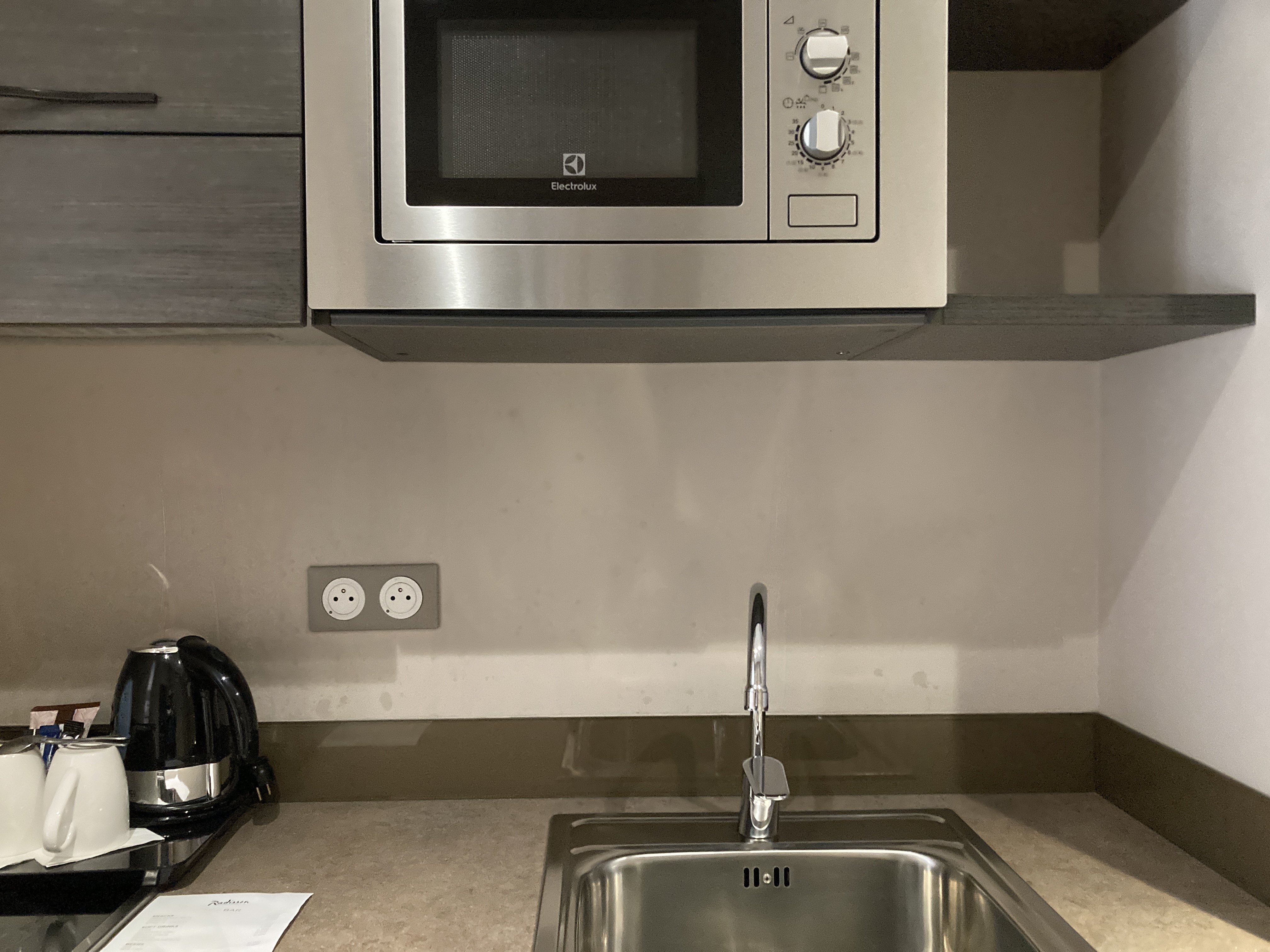 Radisson Serviced Apartments Antananarivo kitchenette sink and microwave Radisson Serviced Apartments Antananarivo kitchenette sink and microwave
