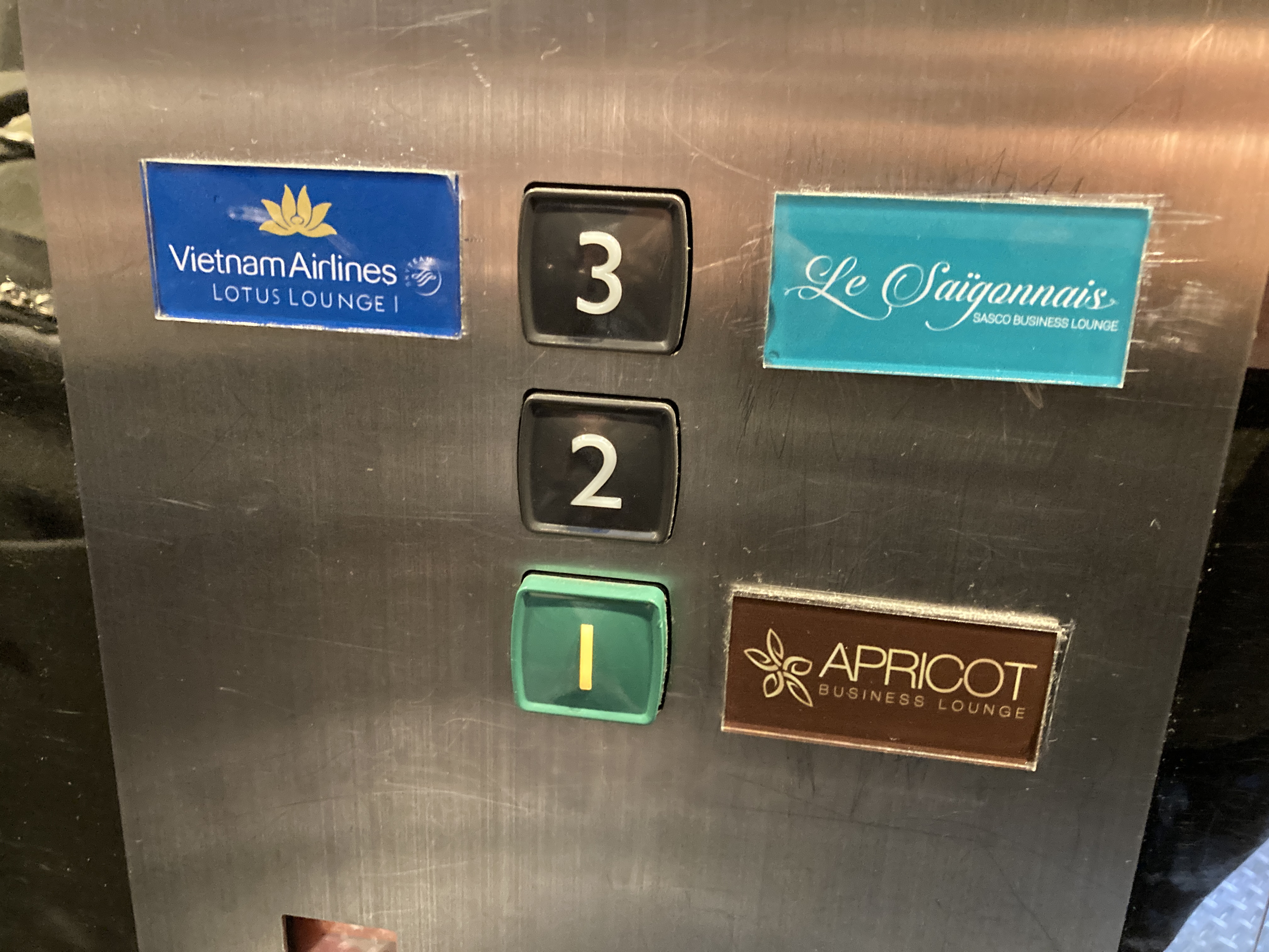 Apricot Business Lounge SGN elevator buttons