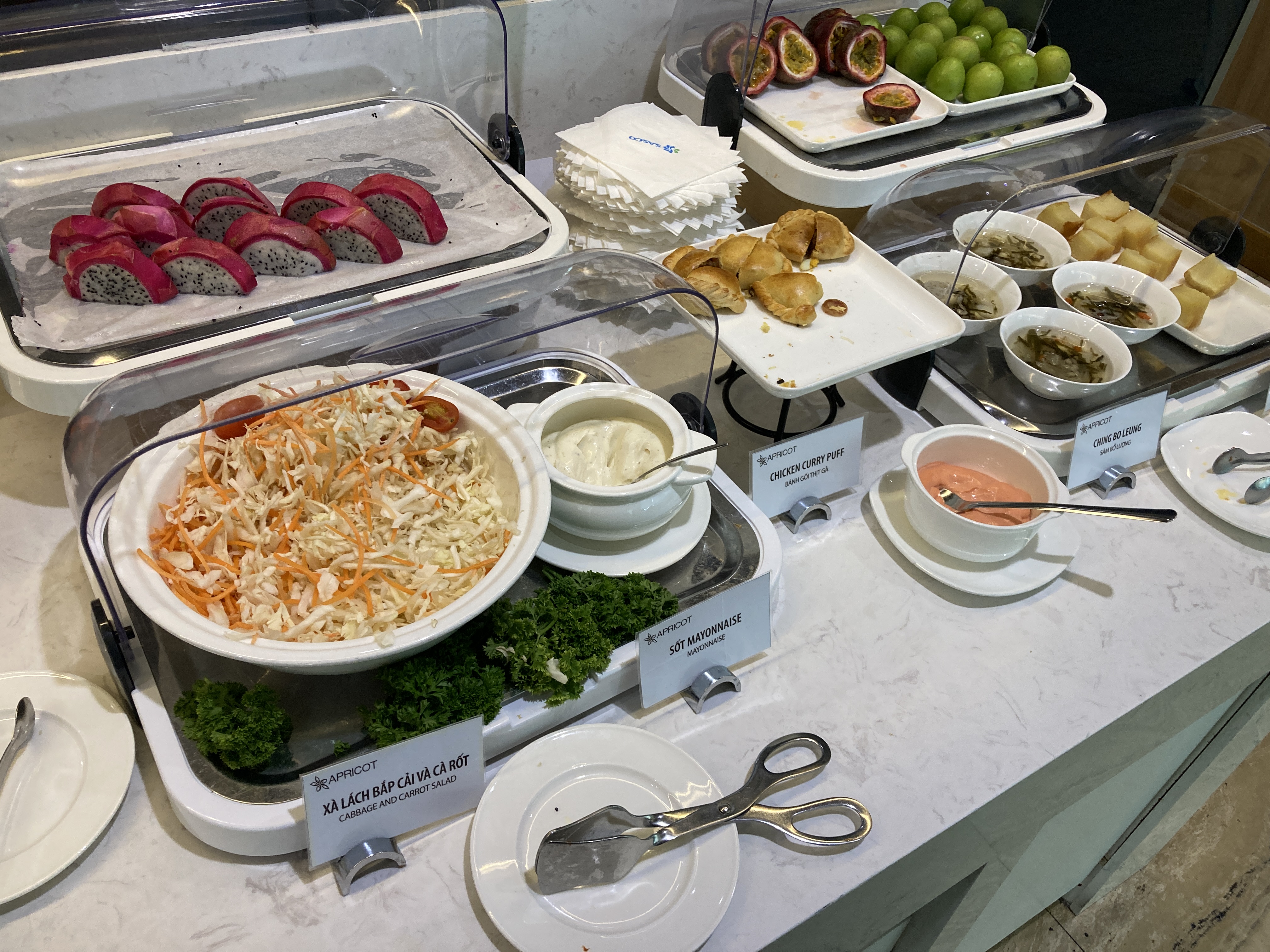 Apricot Business Lounge SGN fruits and dessert