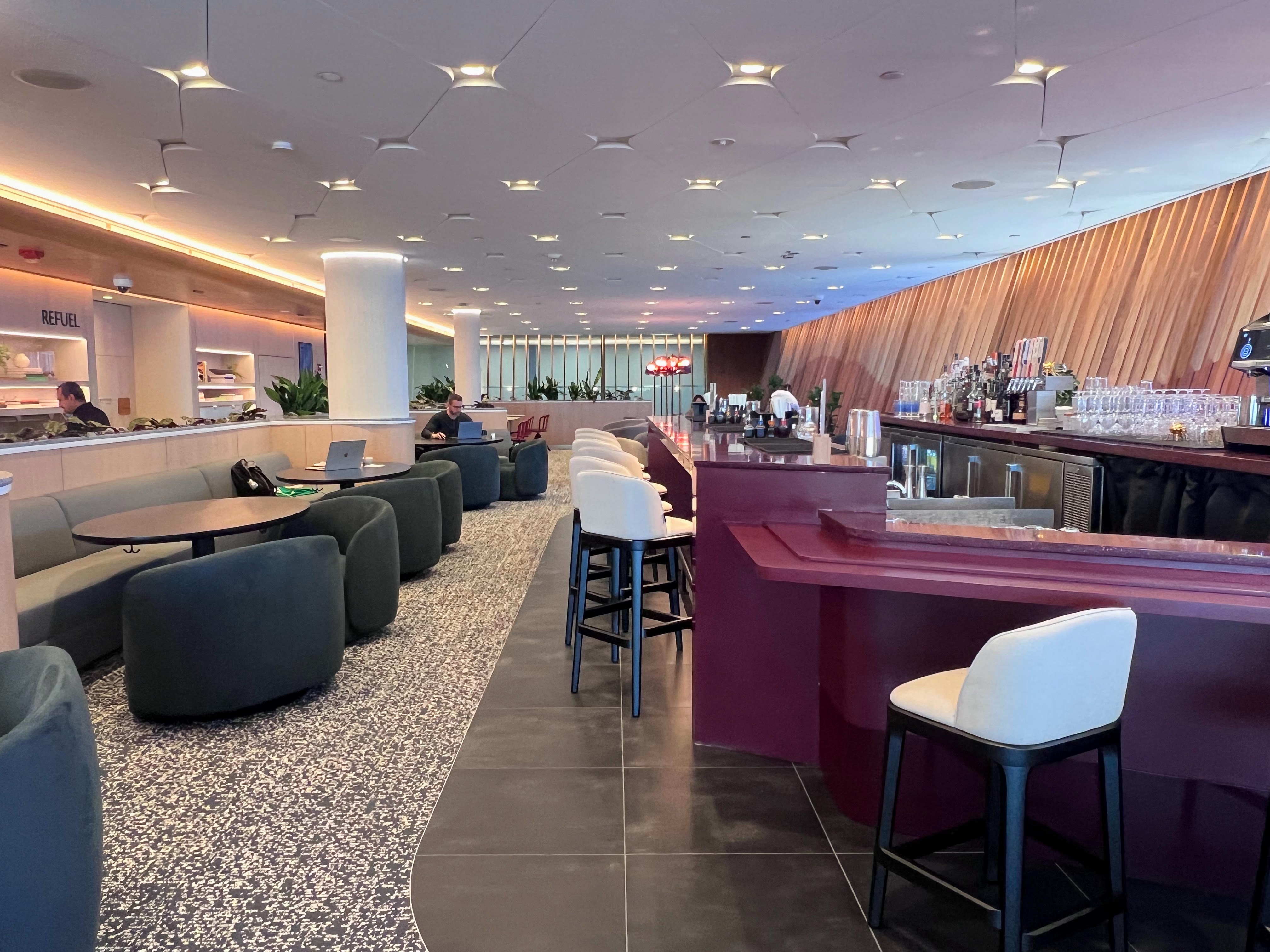 Bar and seating area at Capital One Lounge IAD Dulles Bar and seating area at Capital One Lounge IAD Dulles