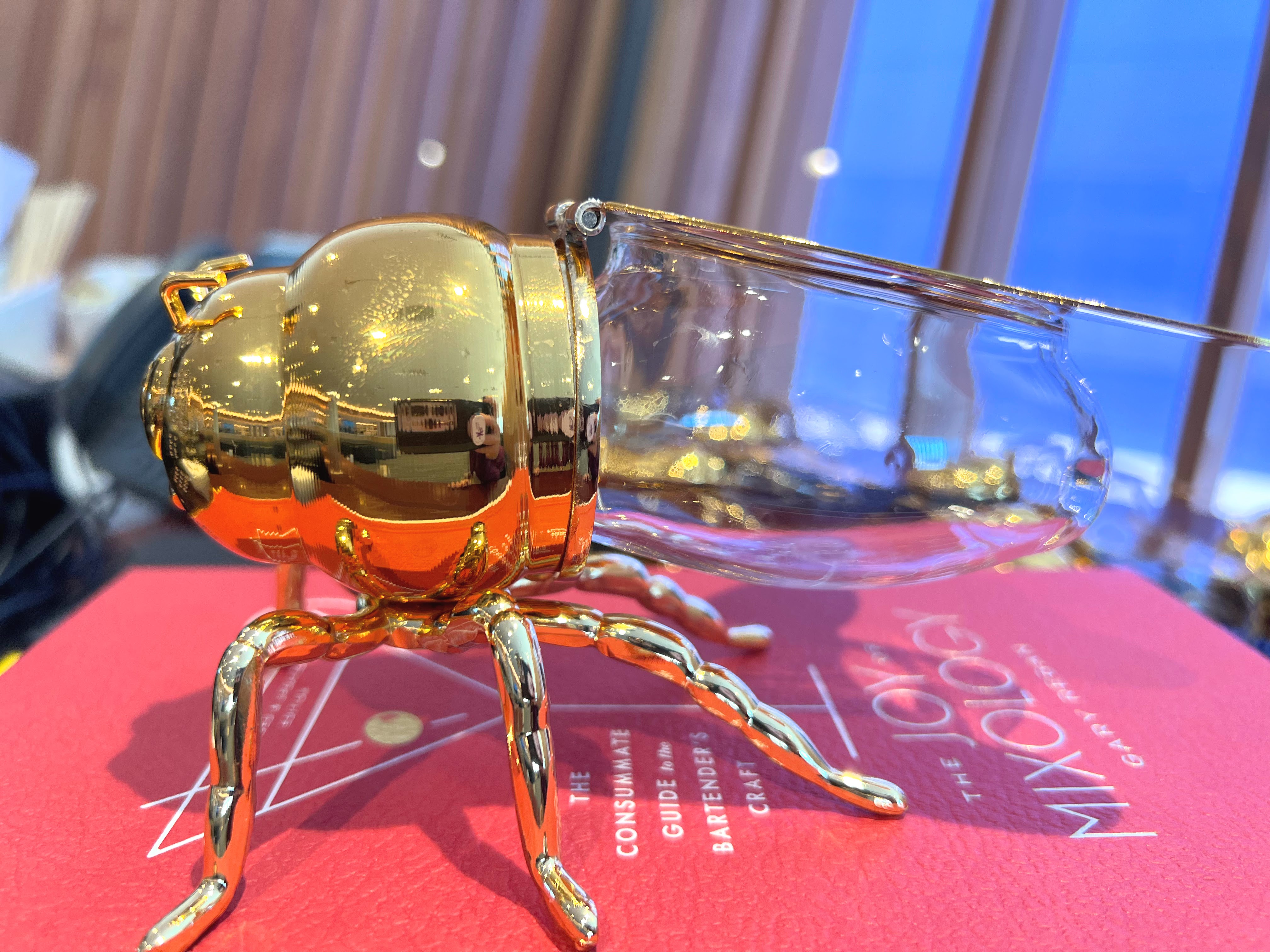 Bees Knees cocktail glass at Capital One Lounge Dulles