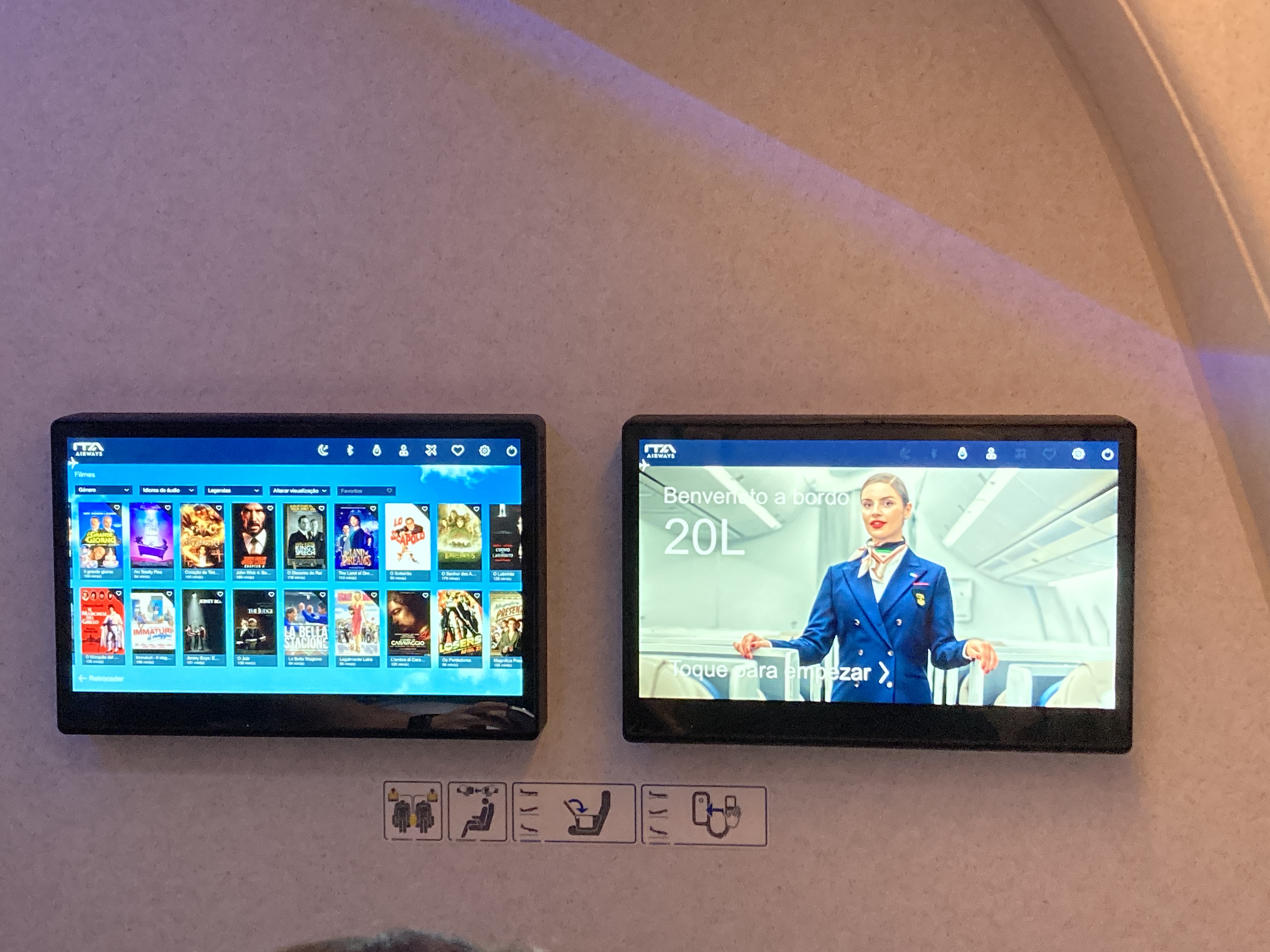 ITA premium economy screens on bulkhead wall GRU FCO ITA premium economy screens on bulkhead wall GRU FCO
