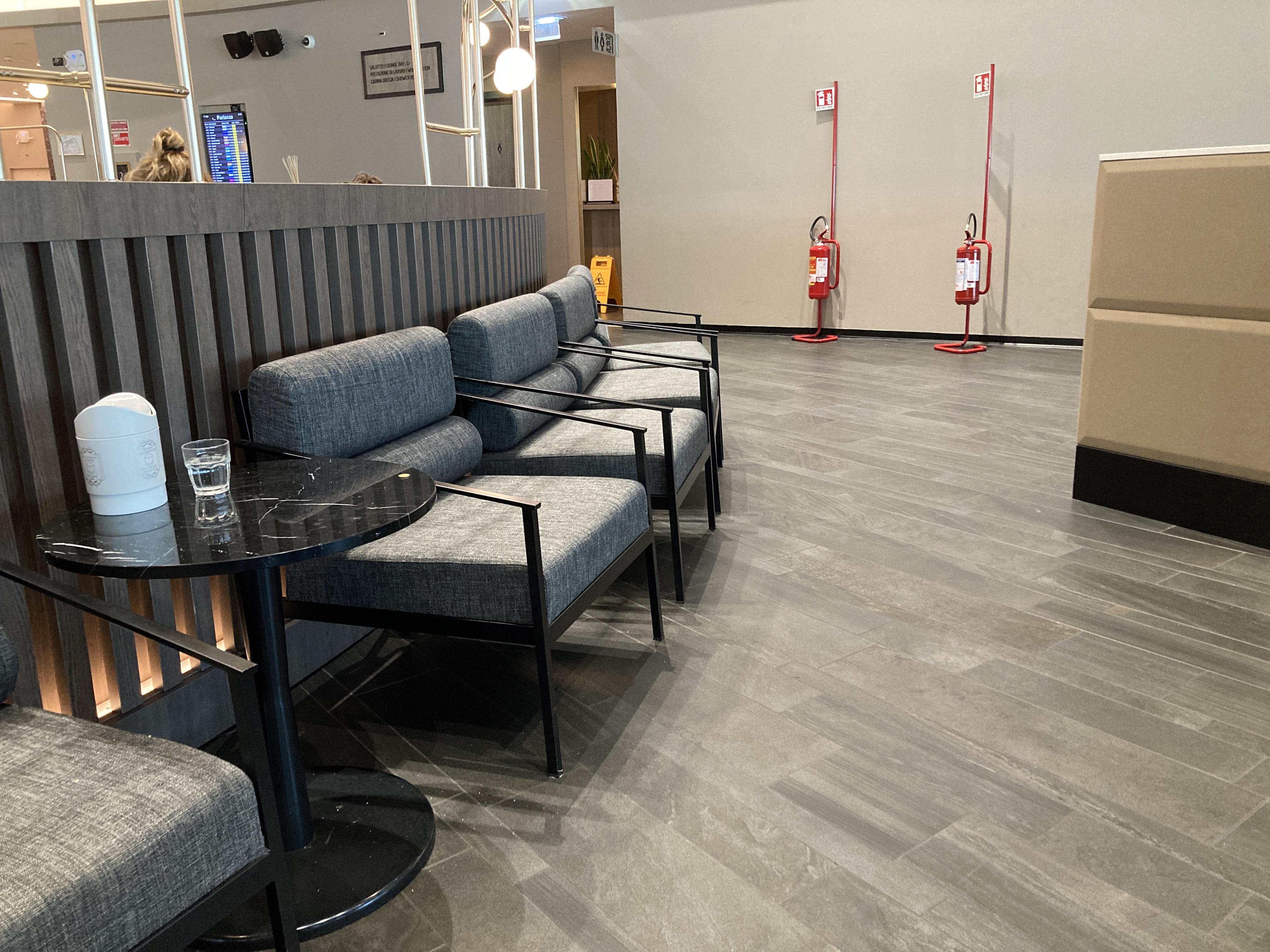 Plaza Premium Lounge Rome FCO seating near cafe