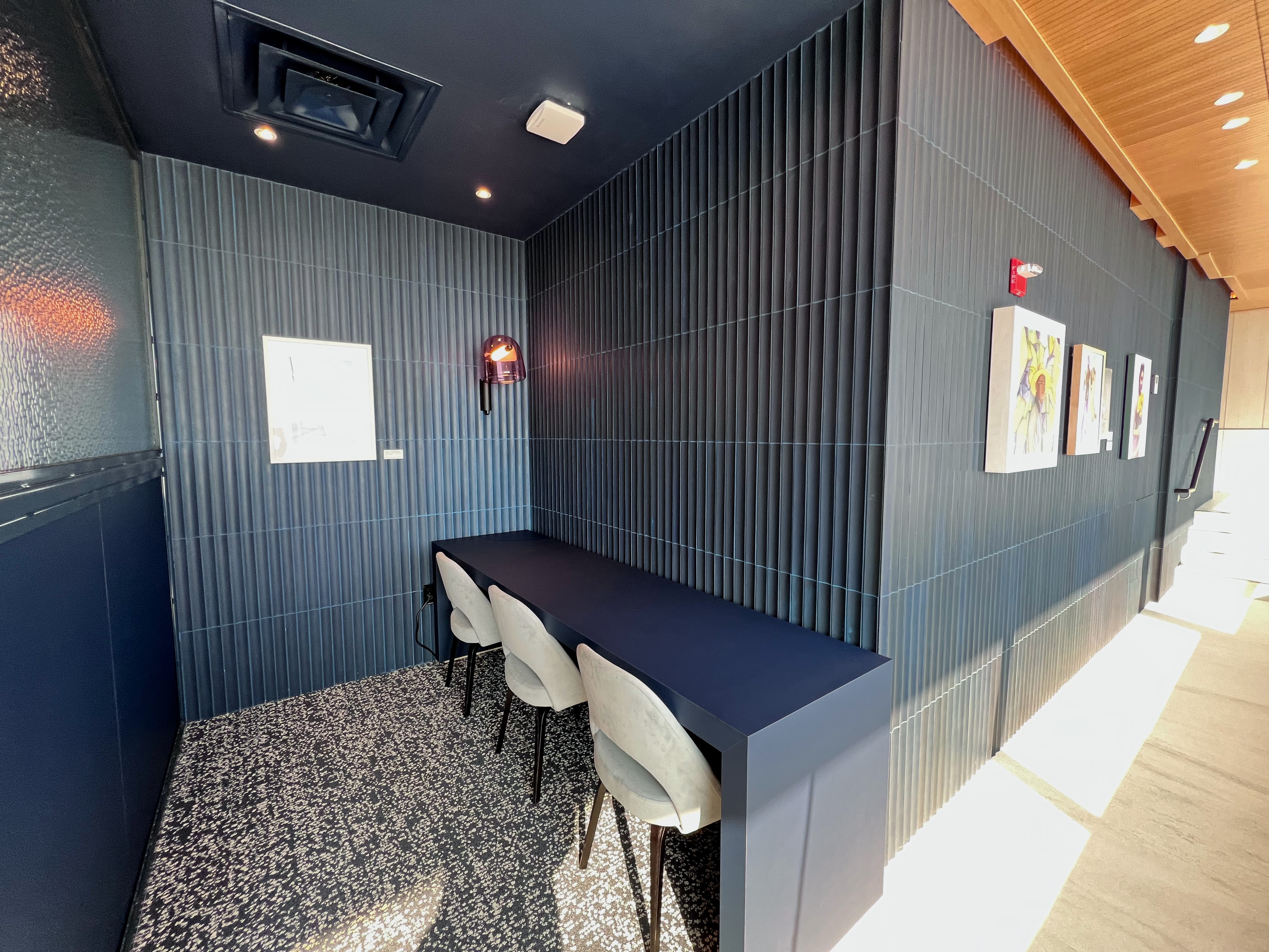 Semi private work area at Capital One Lounge Dulles Airport