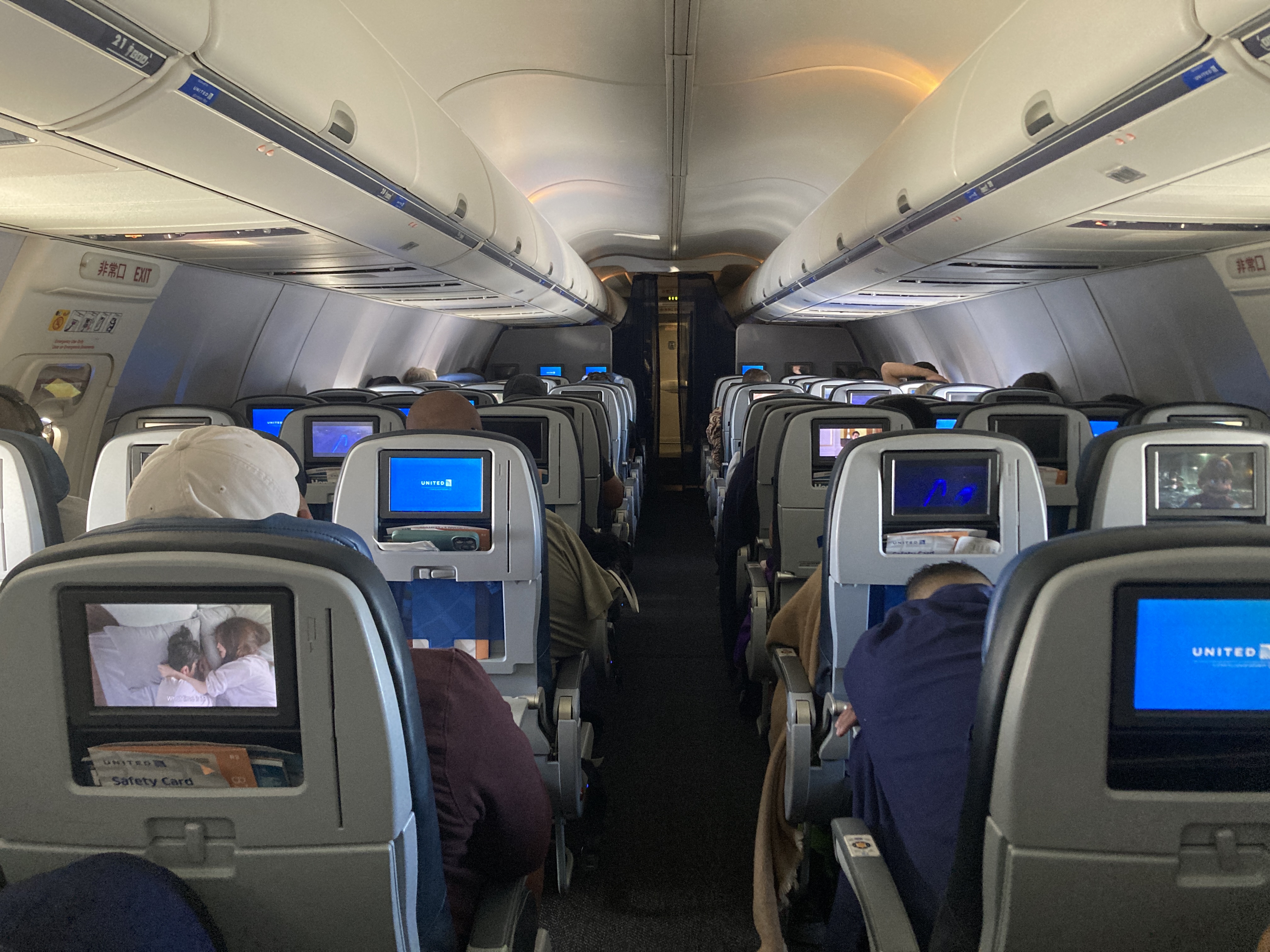 United B737 800 Island Hopper HNL PNI economy cabin view from back