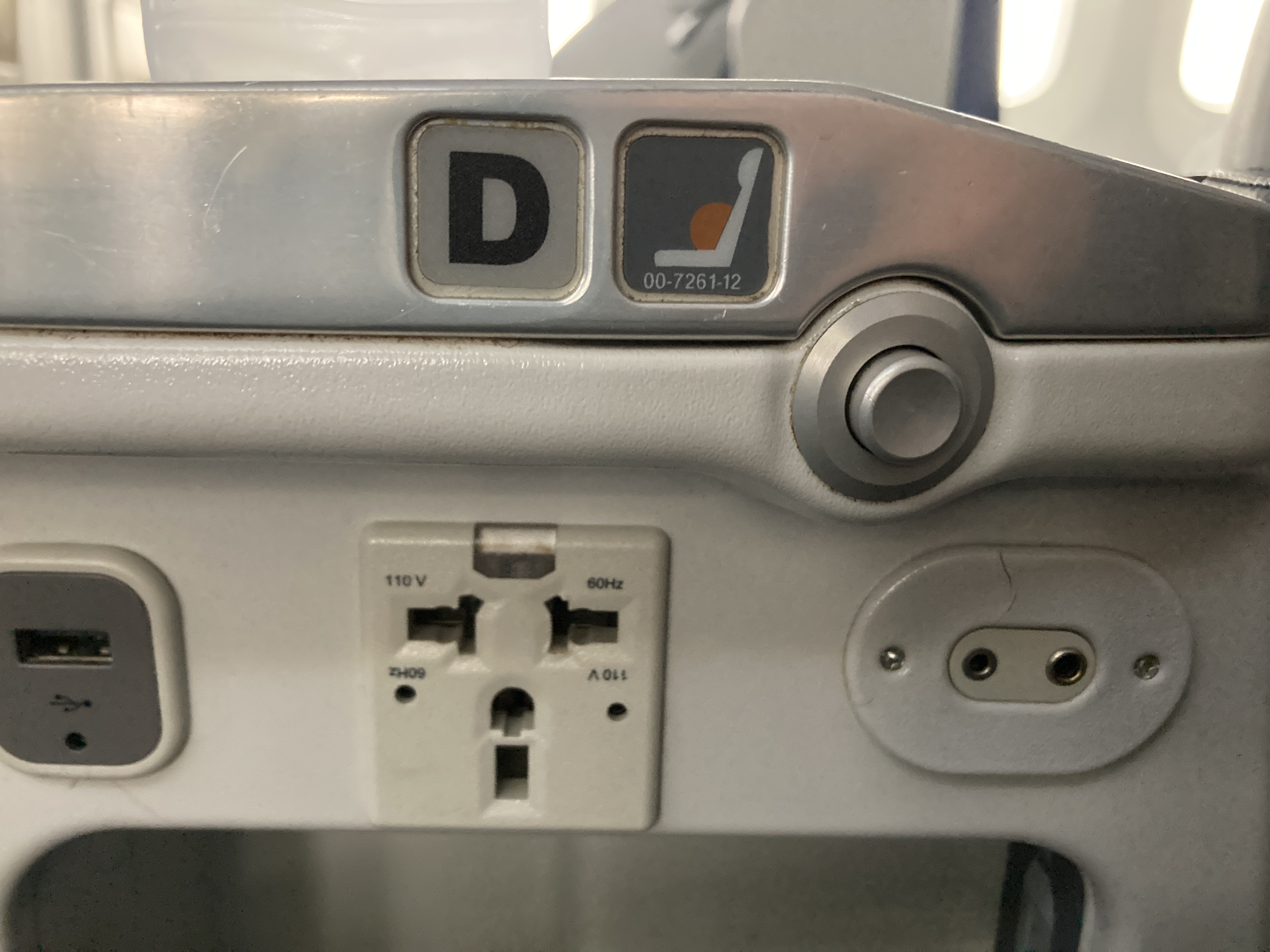 ANA B787 8 business class seat outlets and recline button ANA B787 8 business class seat outlets and recline button