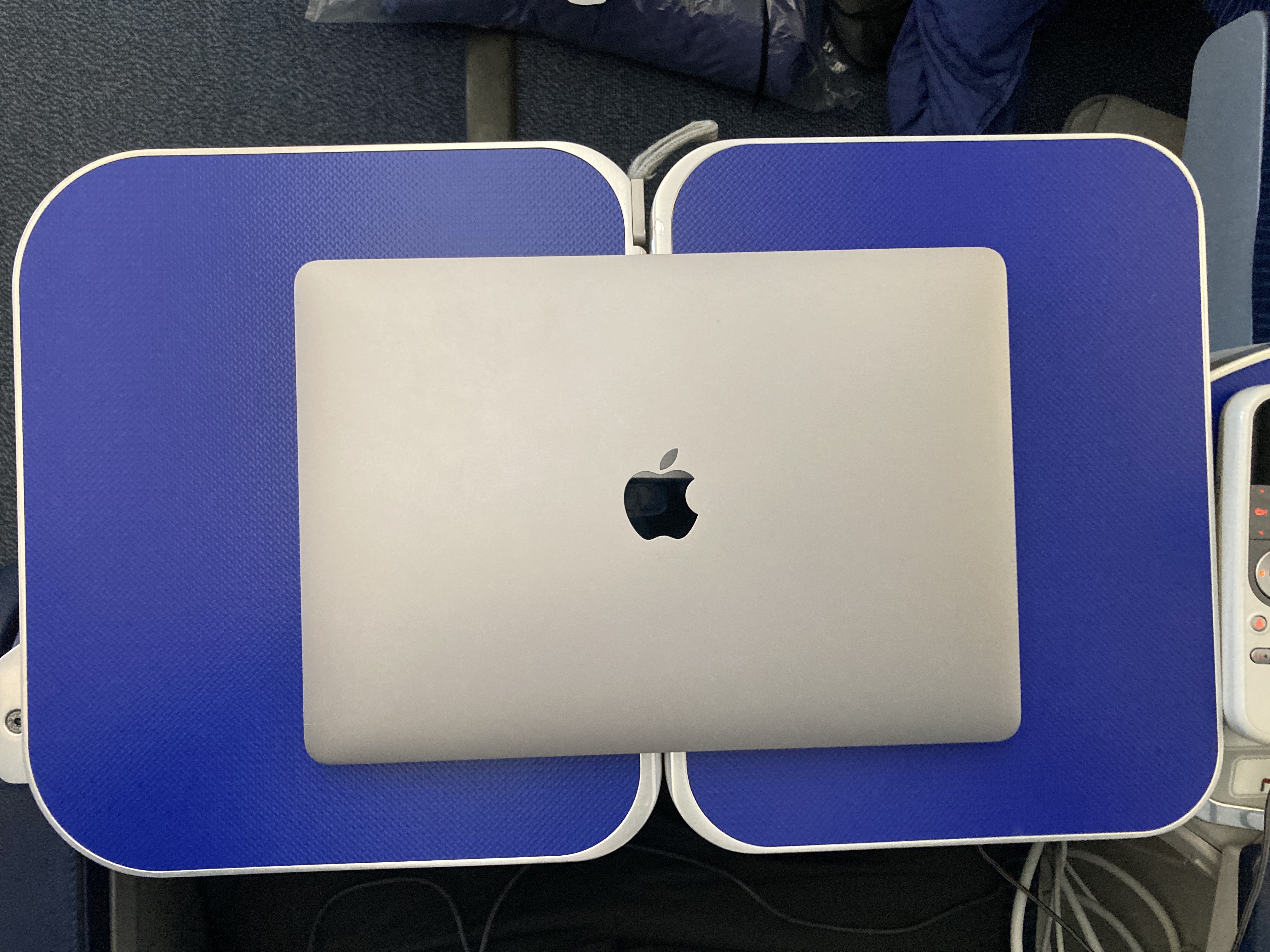 apple watch macbook iphone ANA B787 8 business class tray table with laptop
