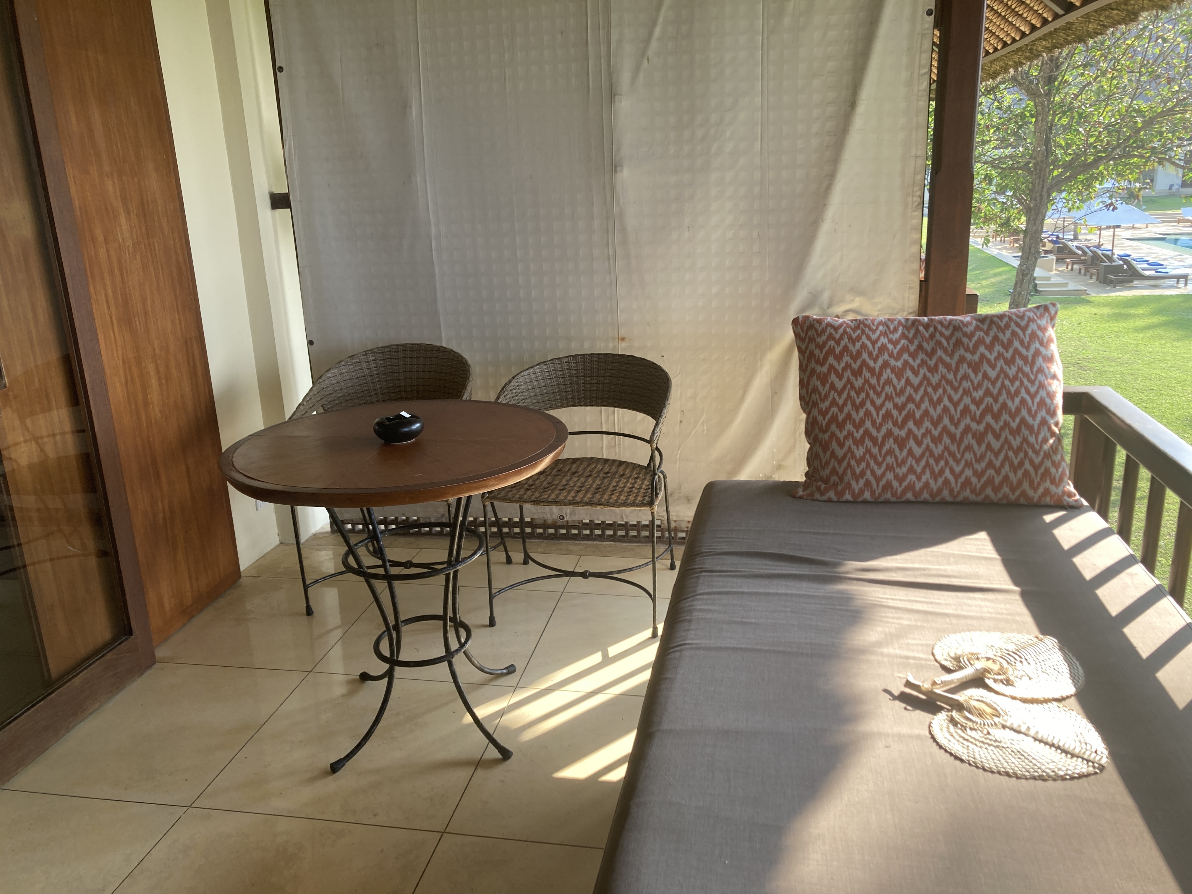 Alila Manggis Bali bedroom balcony with table Alila Manggis Bali bedroom balcony with table