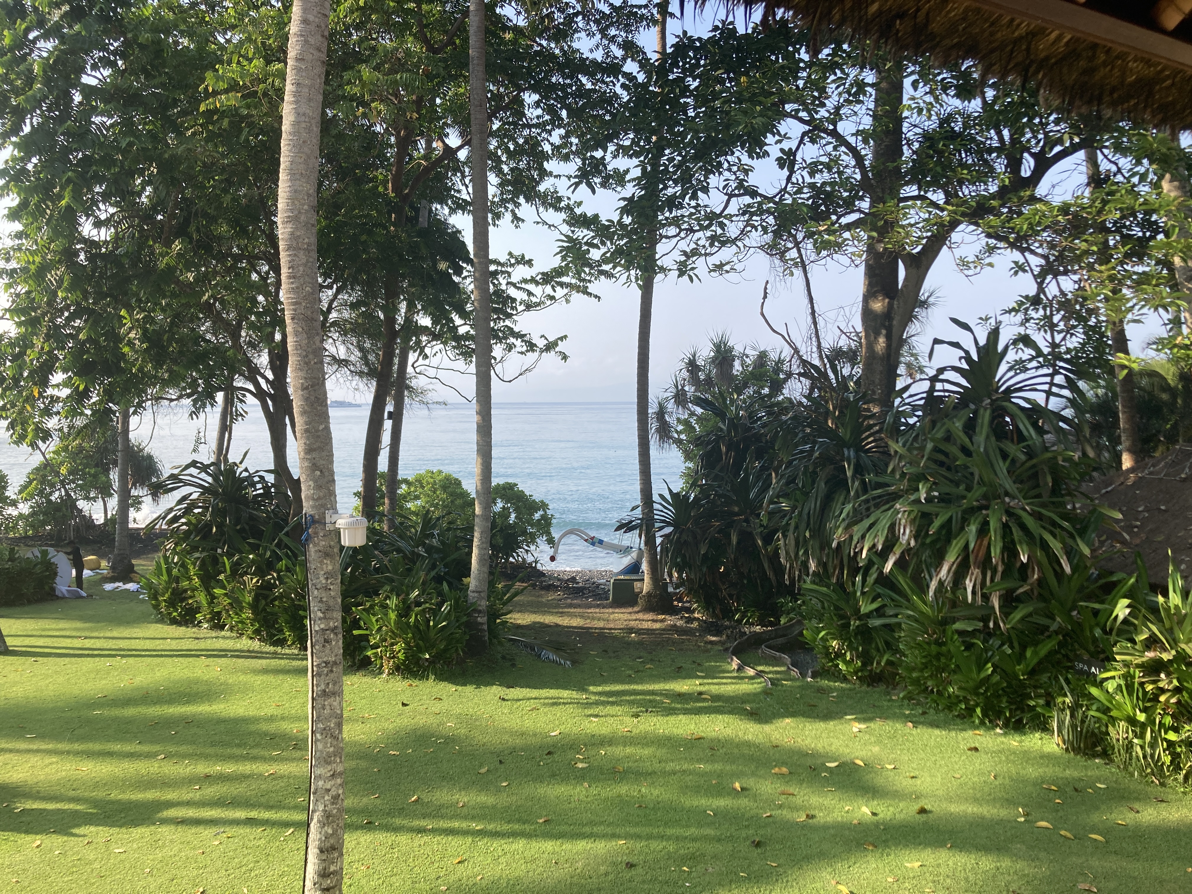 Alila Manggis Bali bedroom view from balcony to sea Alila Manggis Bali bedroom view from balcony to sea