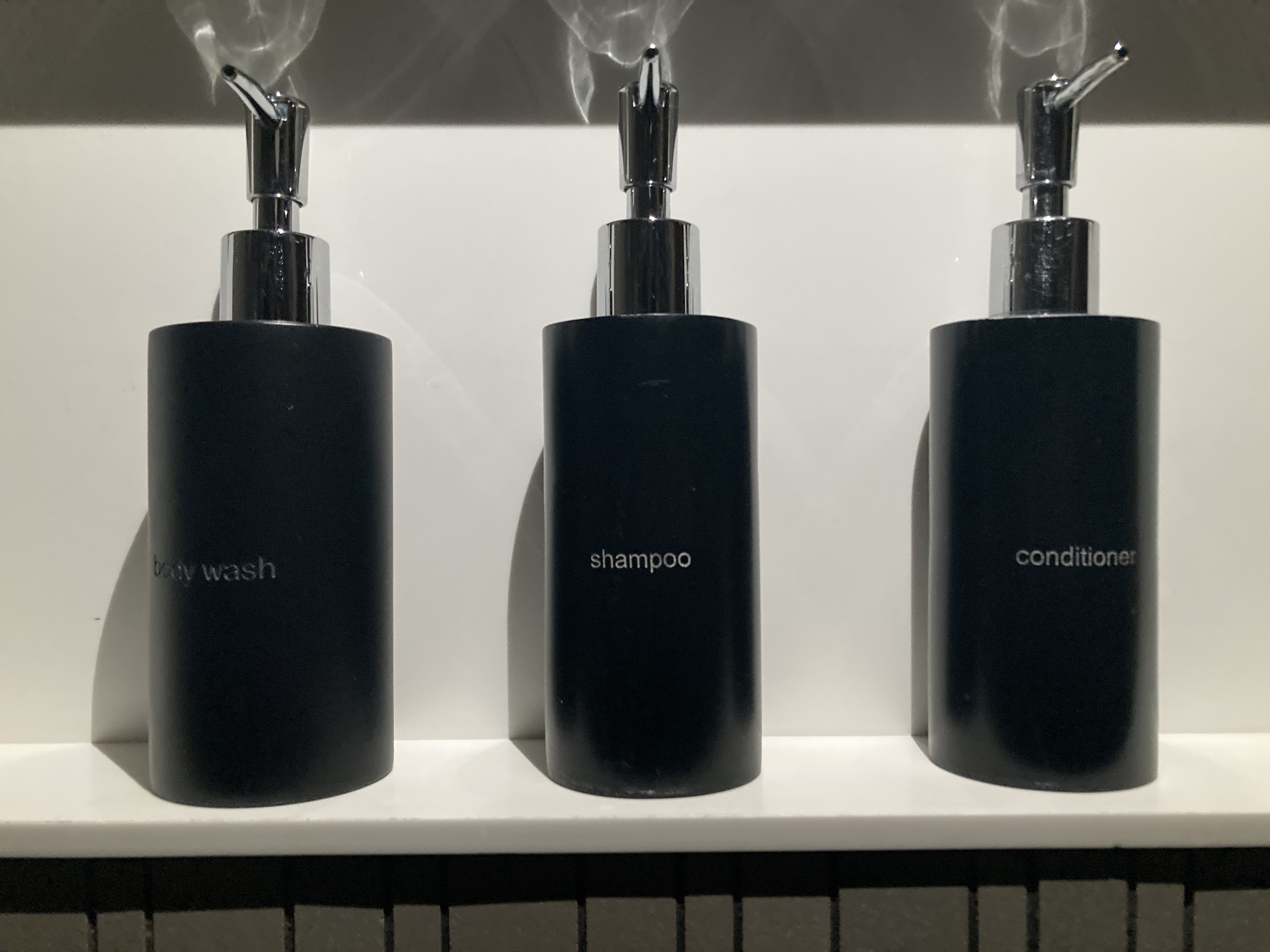 Alila SCBD Jakarta bathroom pump bottles Alila SCBD Jakarta bathroom pump bottles