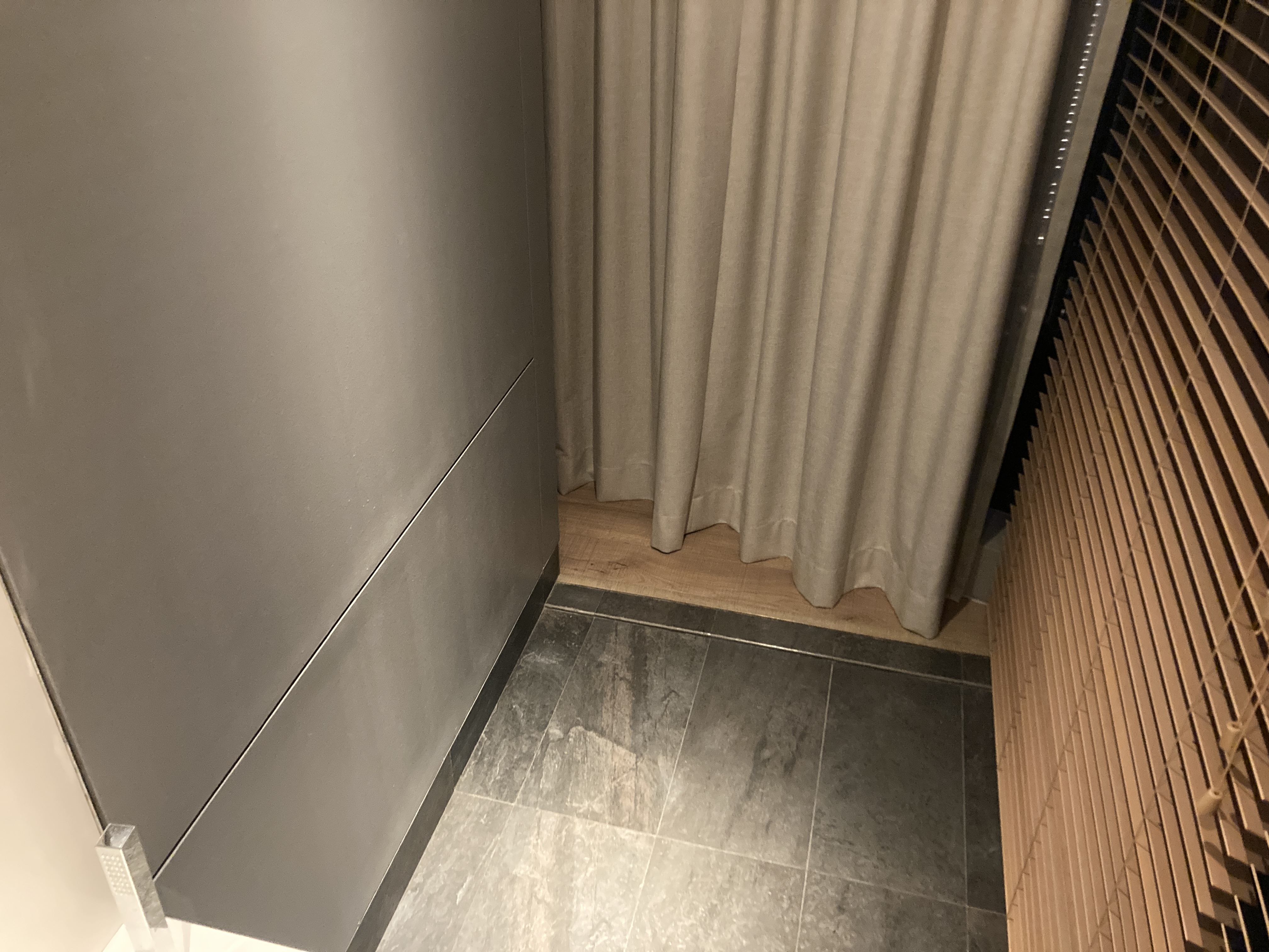 Alila SCBD Jakarta bathroom space behind tub Alila SCBD Jakarta bathroom space behind tub