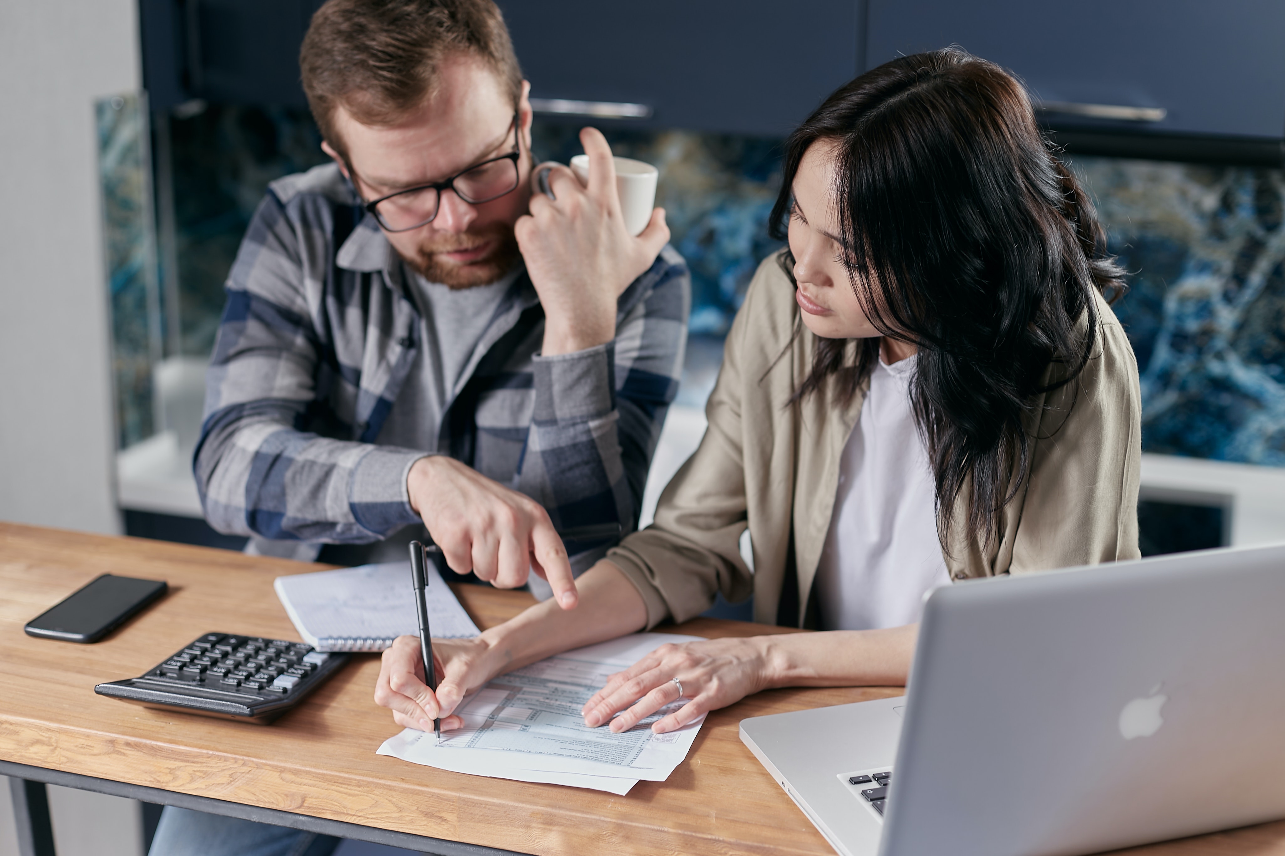 Couple reviewing financial documents