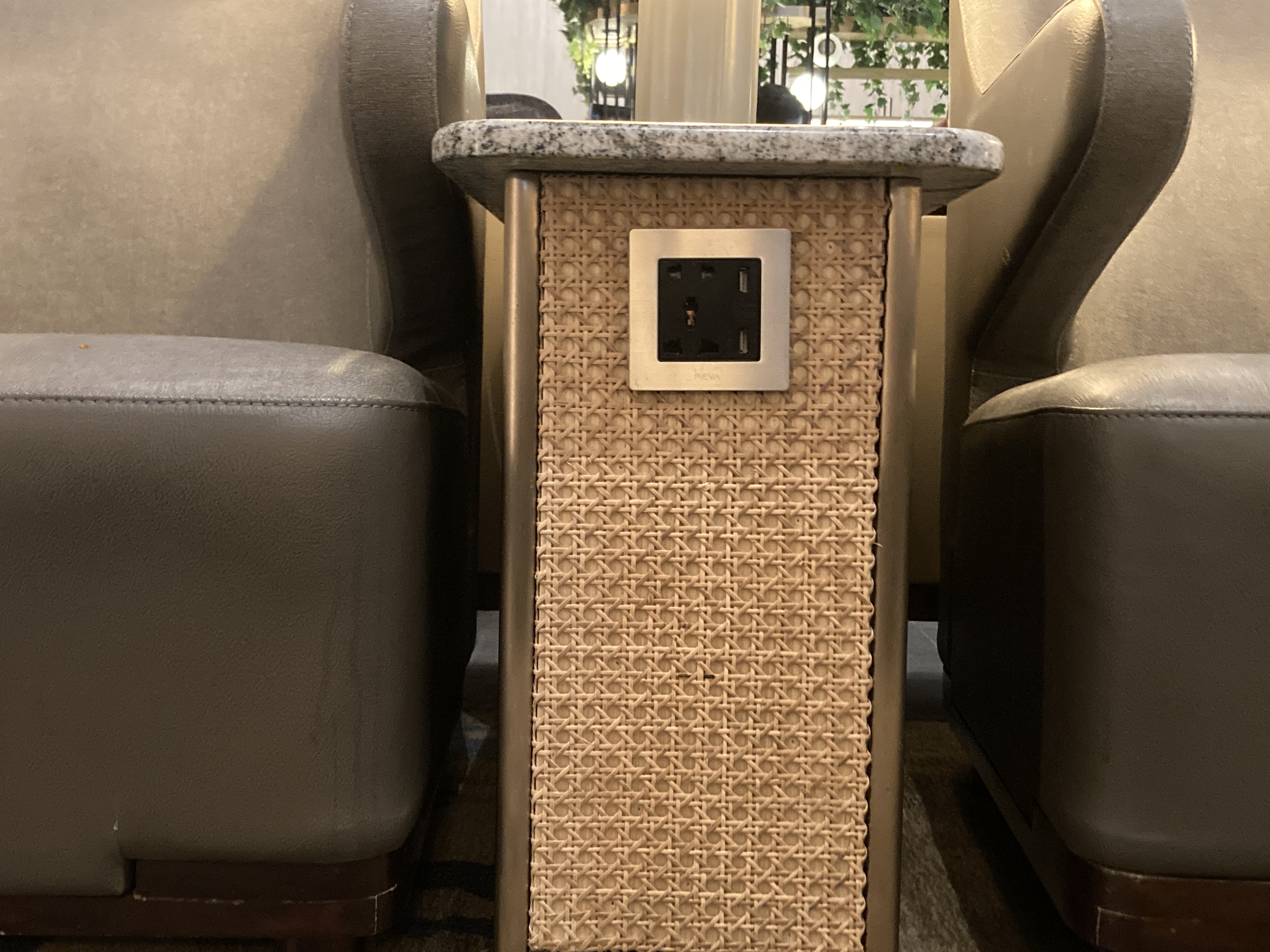 Saphire Plaza Premium Lounge plug between seats at CGK Saphire Plaza Premium Lounge plug between seats at CGK