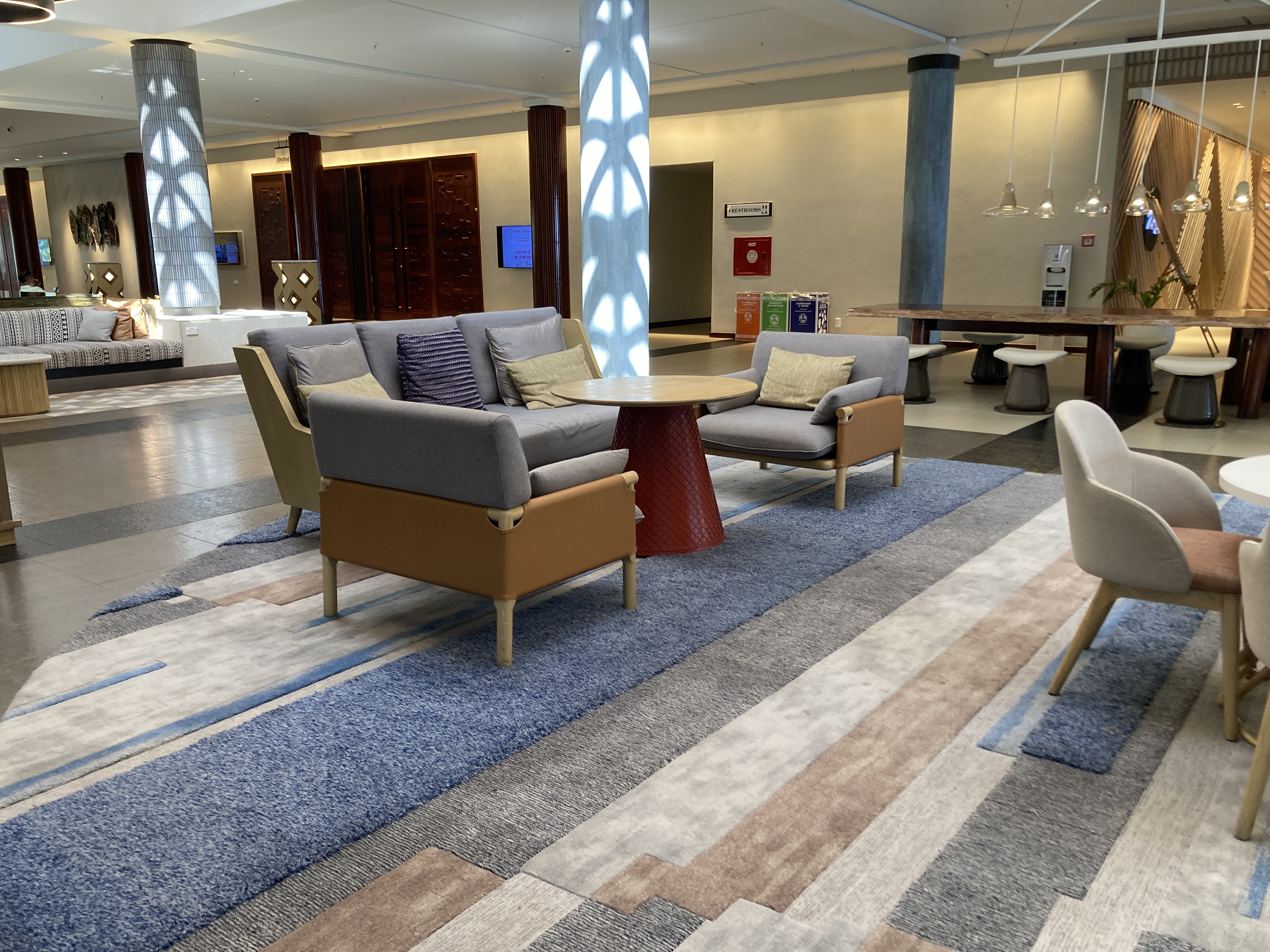 Sheraton Fiji Golf and Beach Resort lobby seating with tables