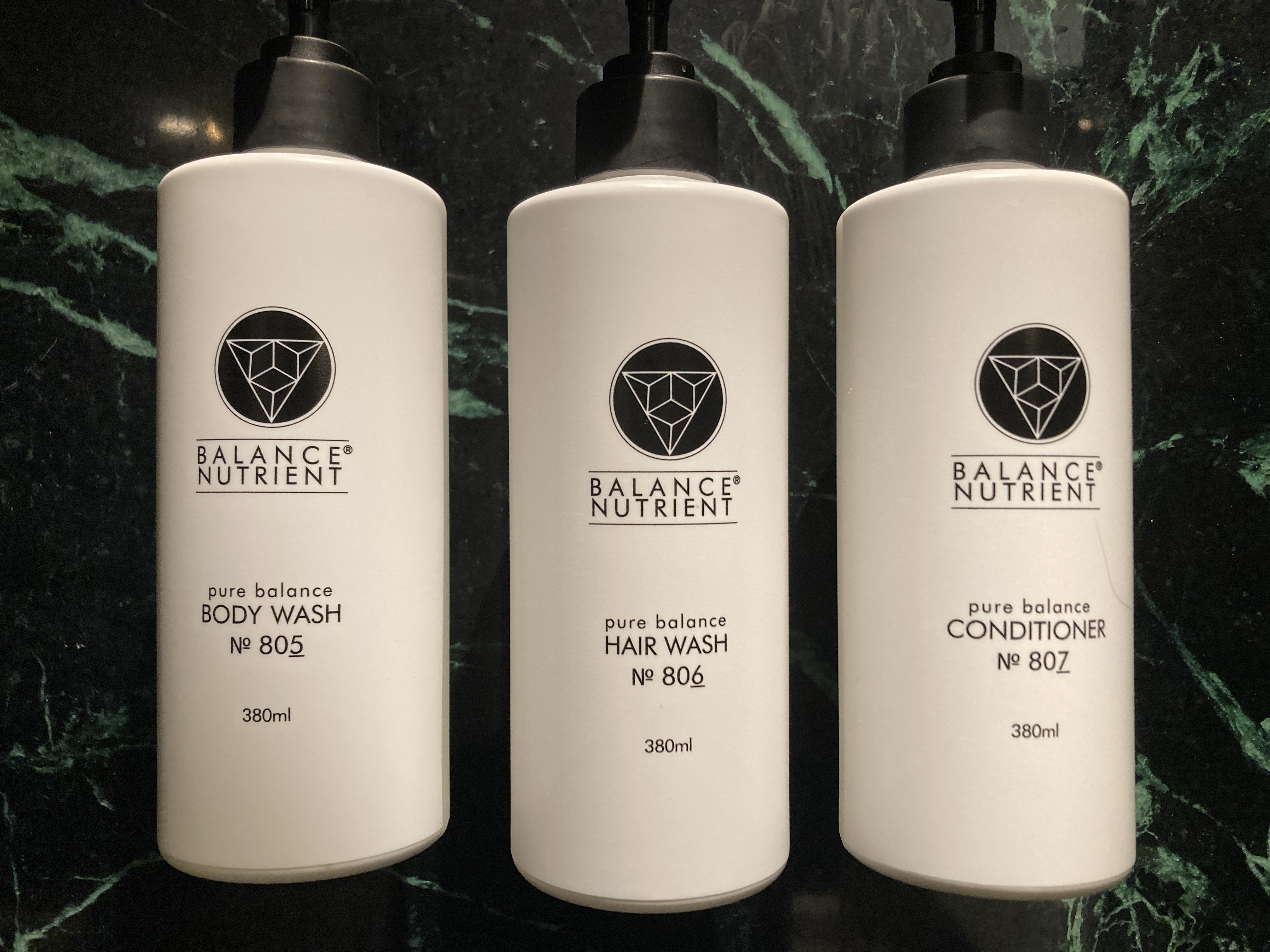 The Serangoon House Singapore Tribute Portfolio pump bottles of toiletries