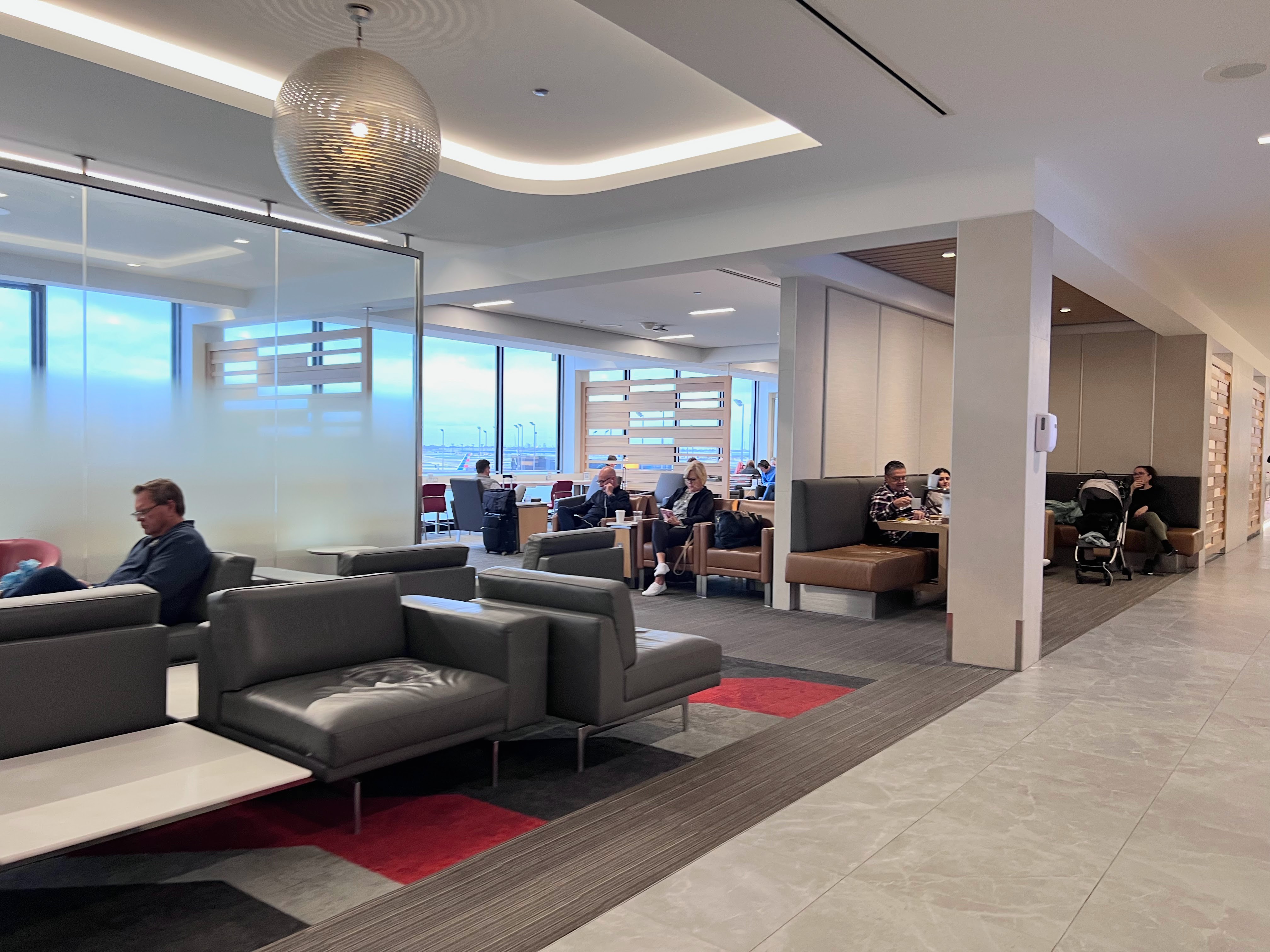 Admirals Club ORD Concourse HK seating area Admirals Club ORD Concourse HK seating area