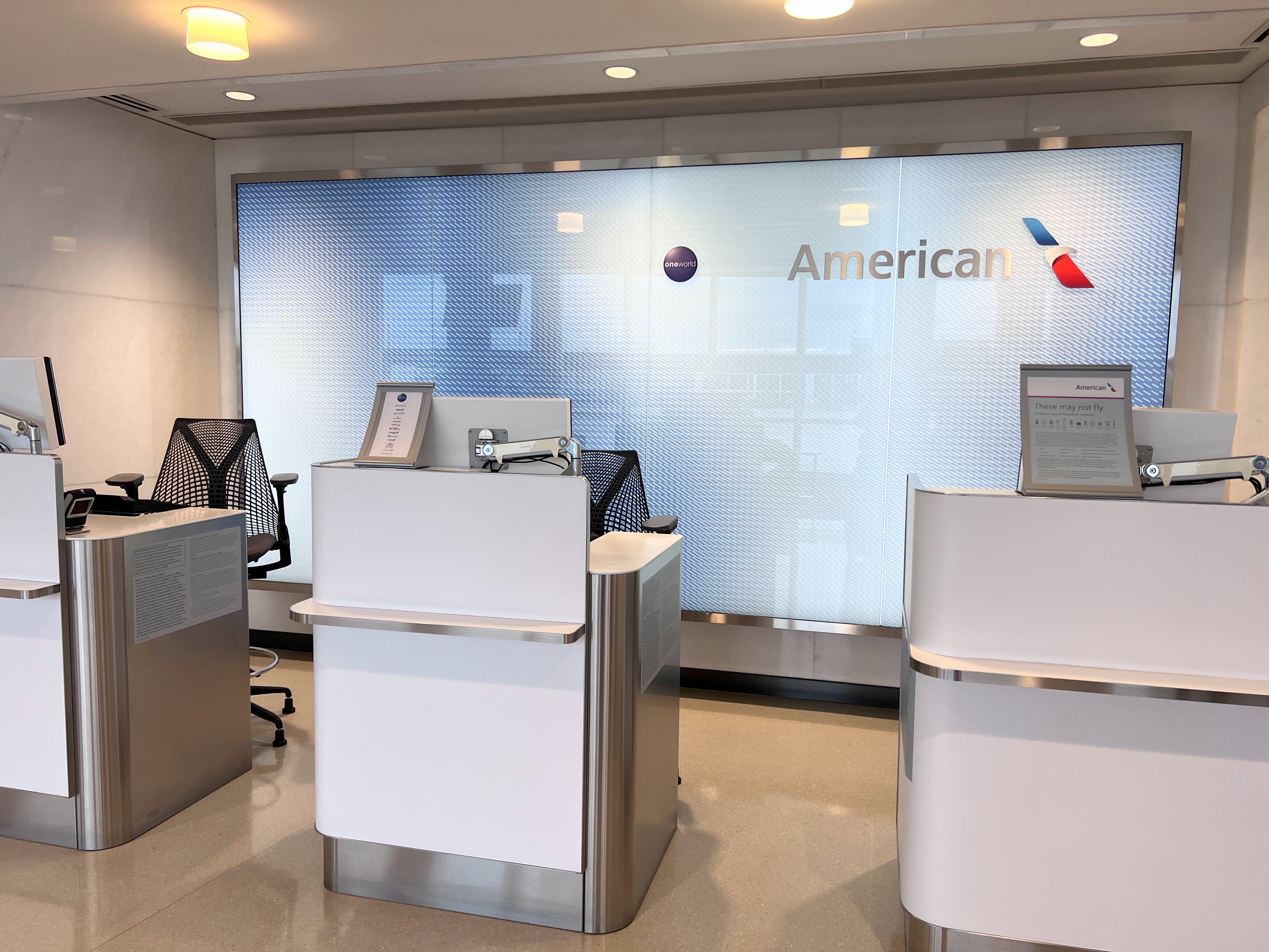 American Airlines customer service desk in the Admirals Club Lounge ORD Concourse G American Airlines customer service desk in the Admirals Club Lounge ORD Concourse G