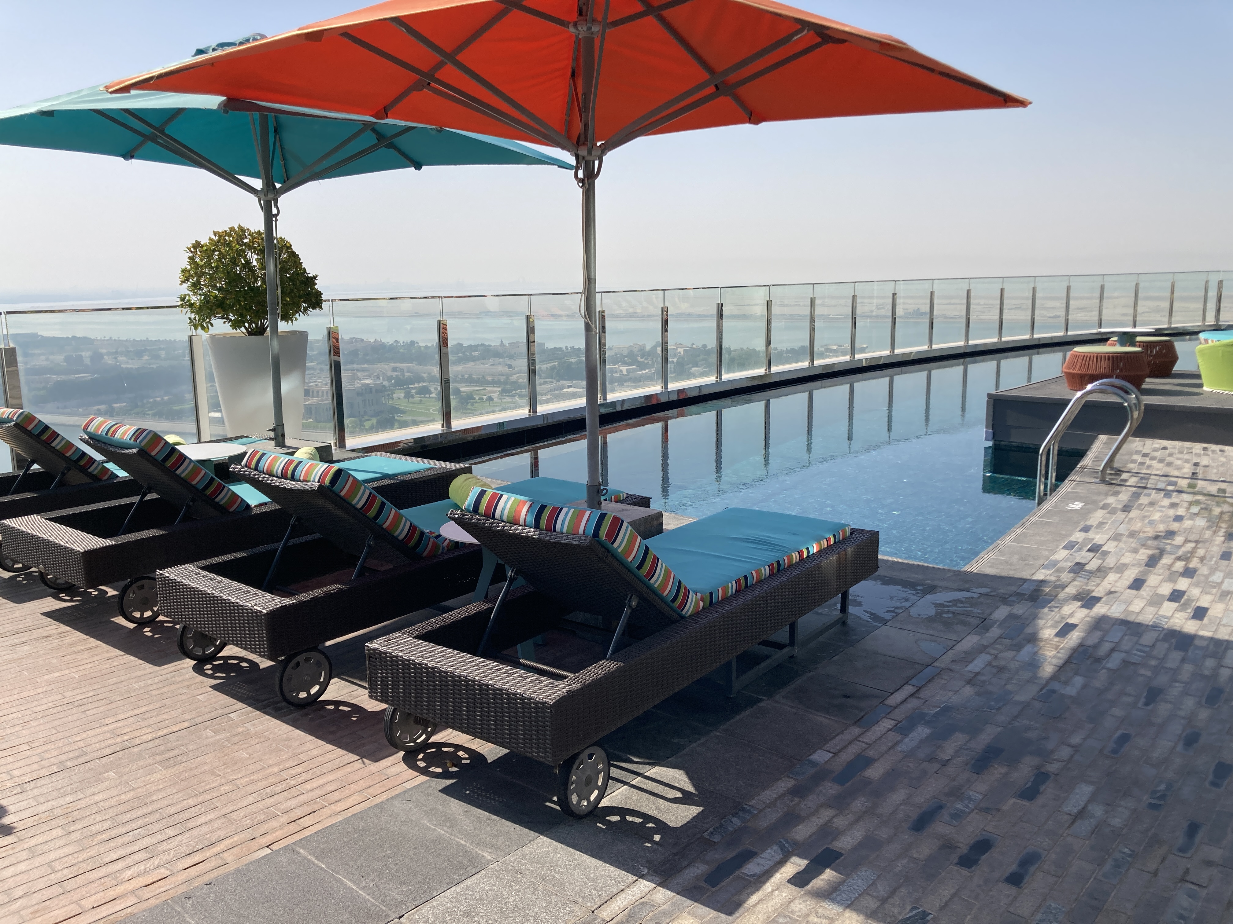 Andaz Capital Gate Abu Dhabi loungers umbrellas