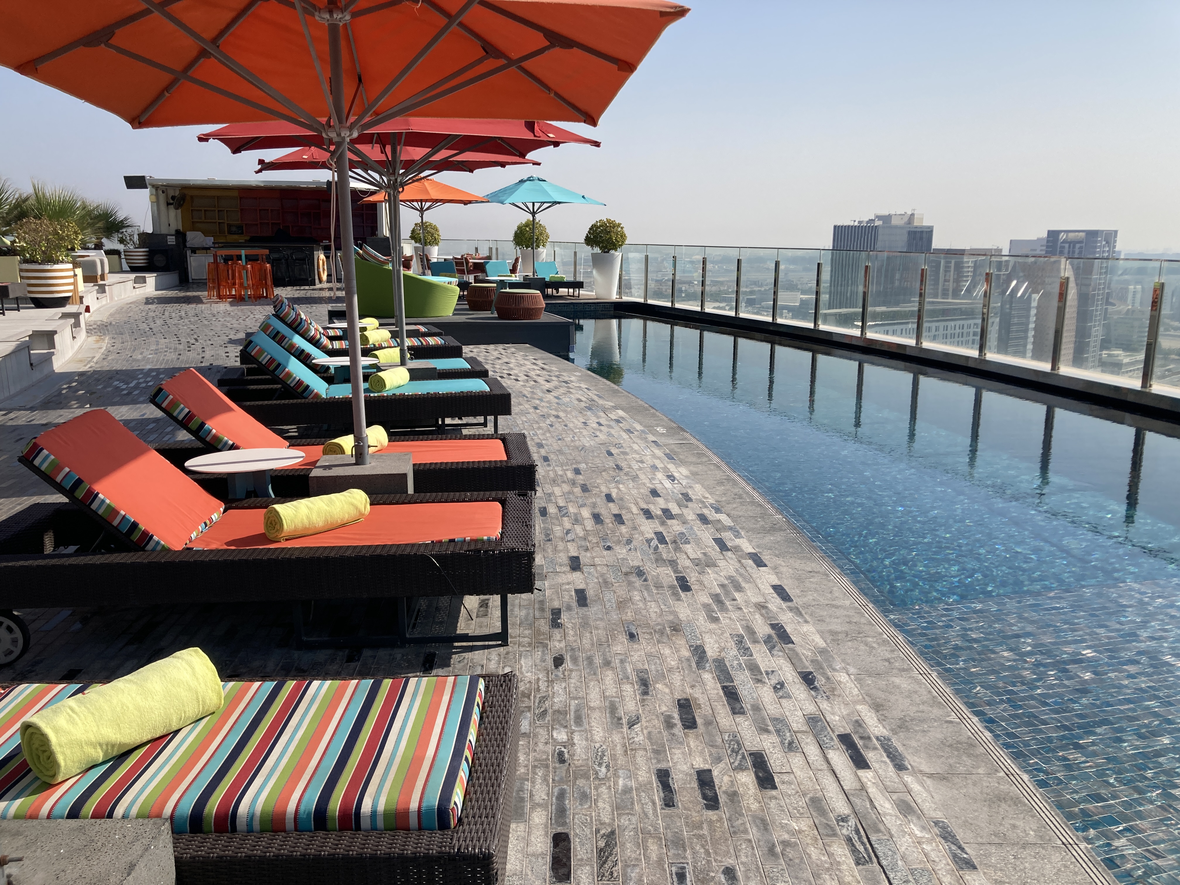 Andaz Capital Gate Abu Dhabi pool deck loungers