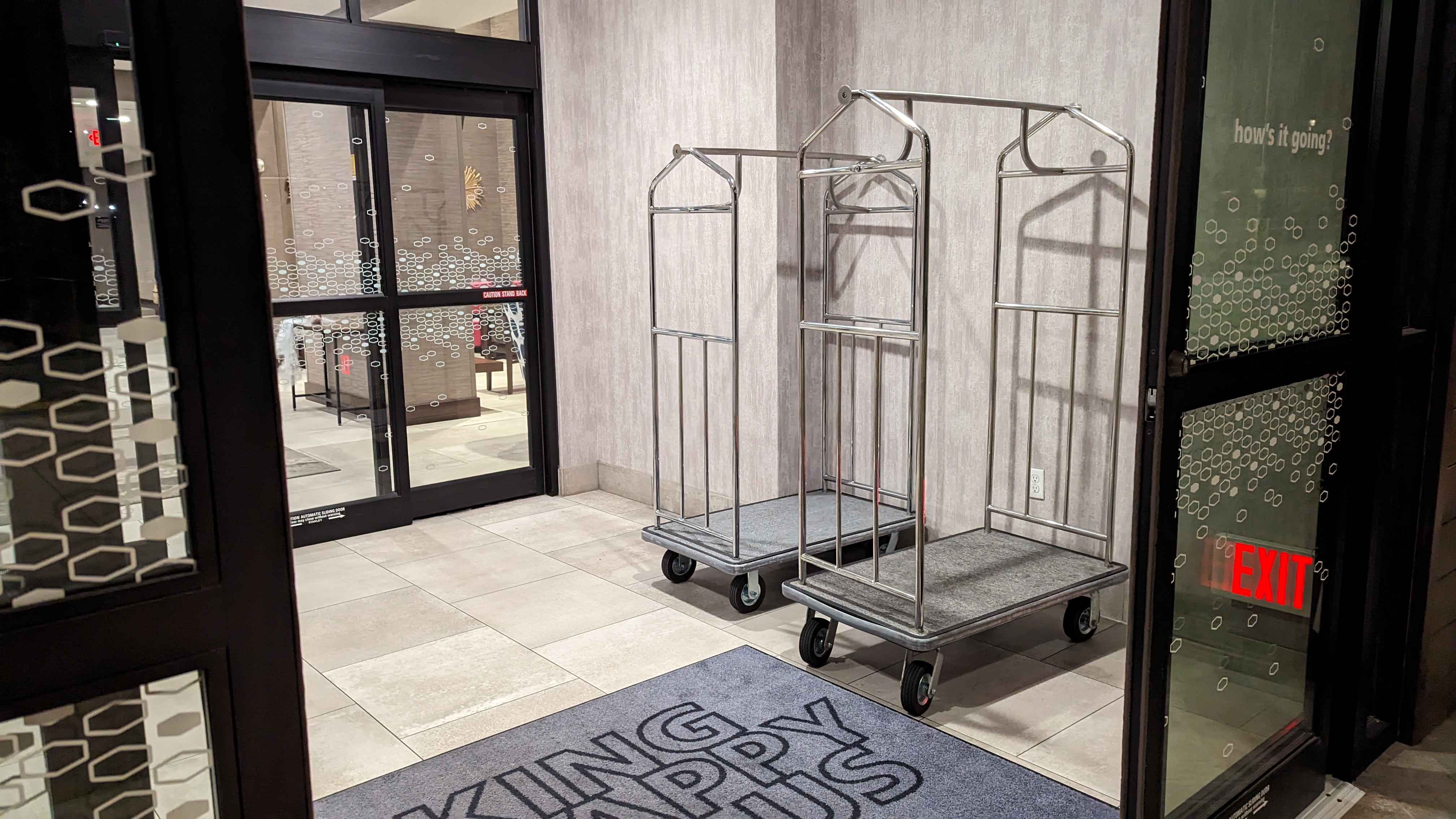 Hampton Inn and Suites Aurora South Denver entrance luggage carts