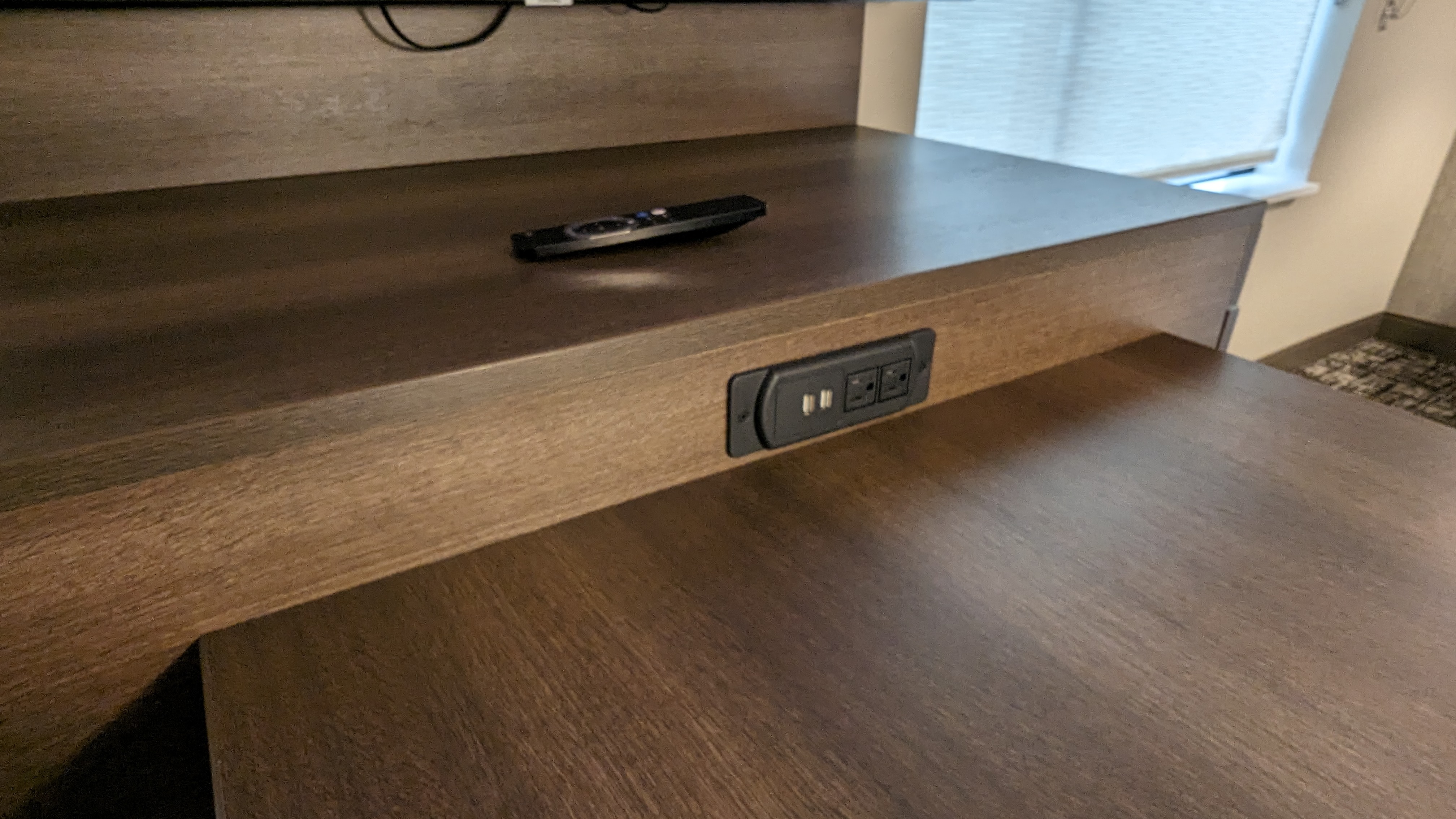 Hampton Inn and Suites Aurora South Denver room entertainment center and desk plugs