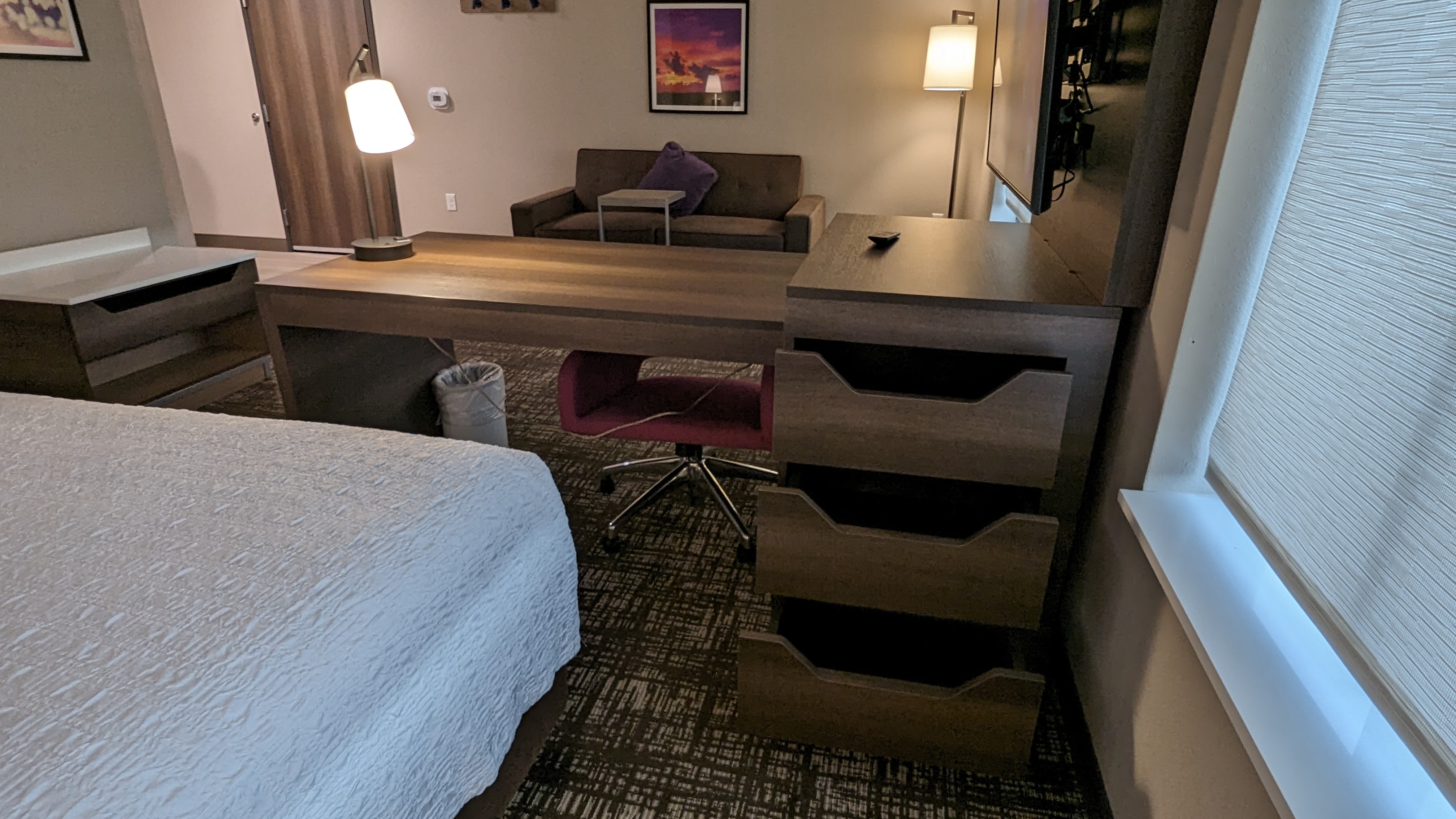 Hampton Inn and Suites Aurora South Denver room entertainment center and desk storage