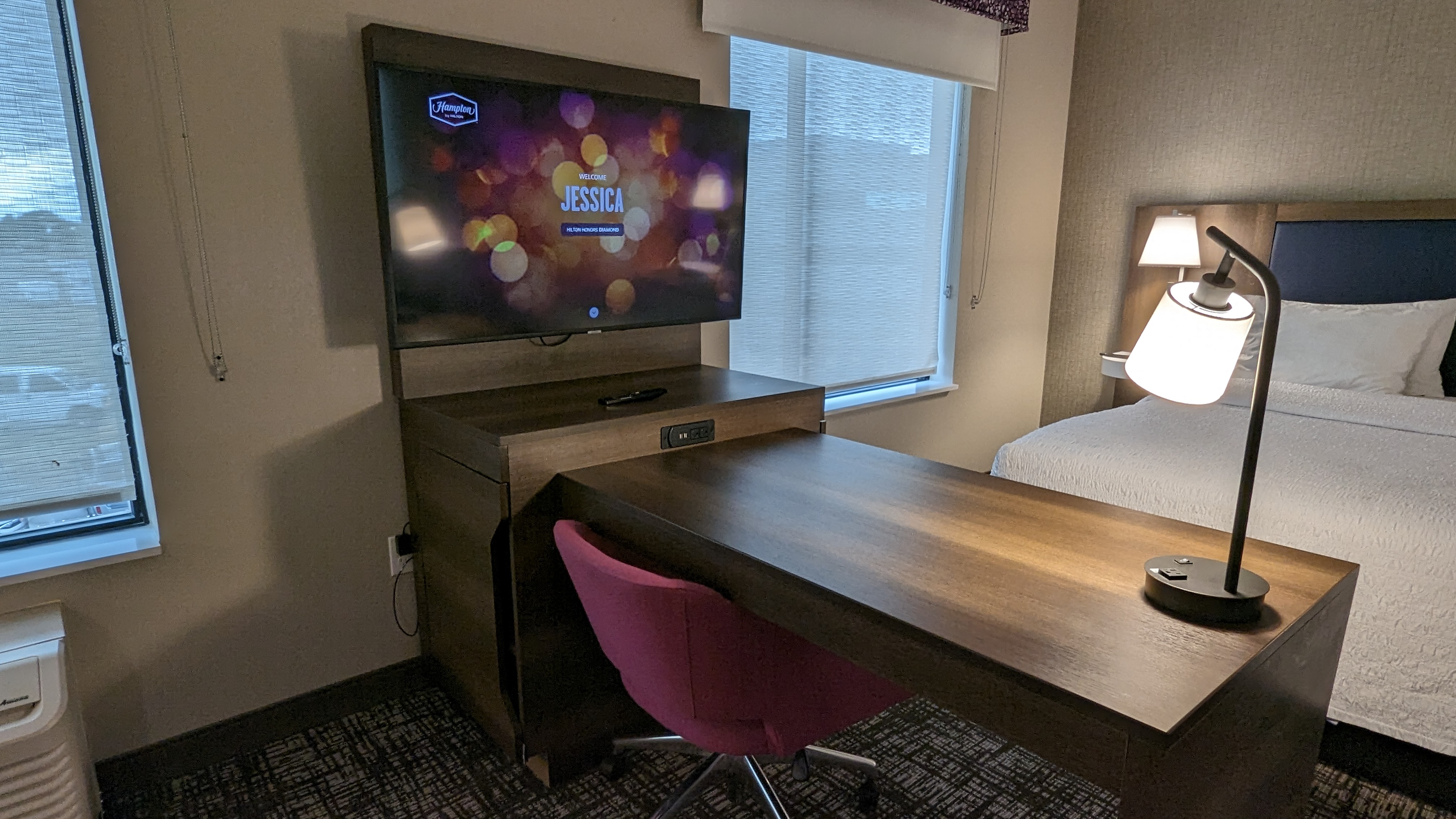 Hampton Inn and Suites Aurora South Denver room entertainment center and desk