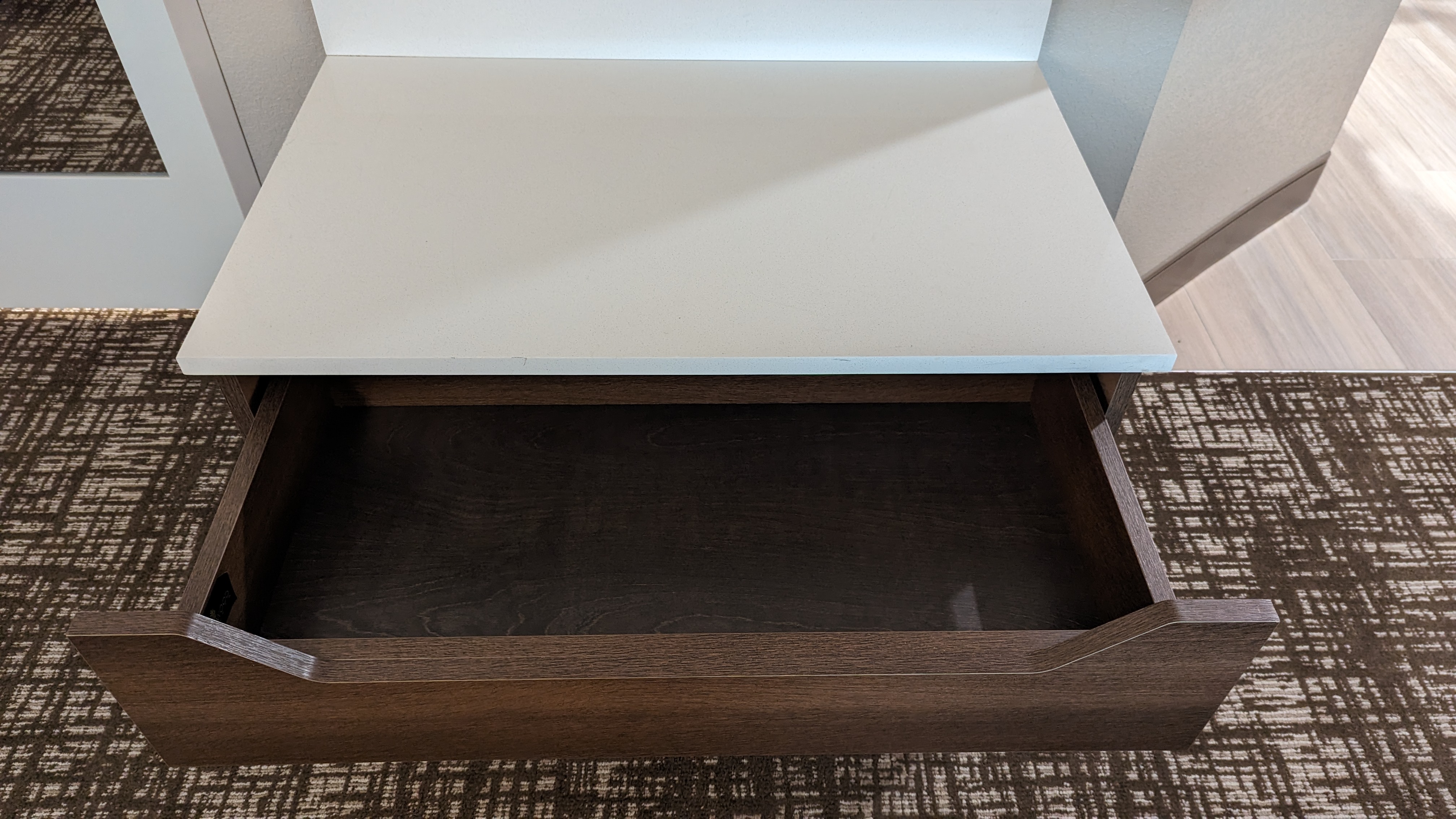Hampton Inn and Suites Aurora South Denver room storage drawer