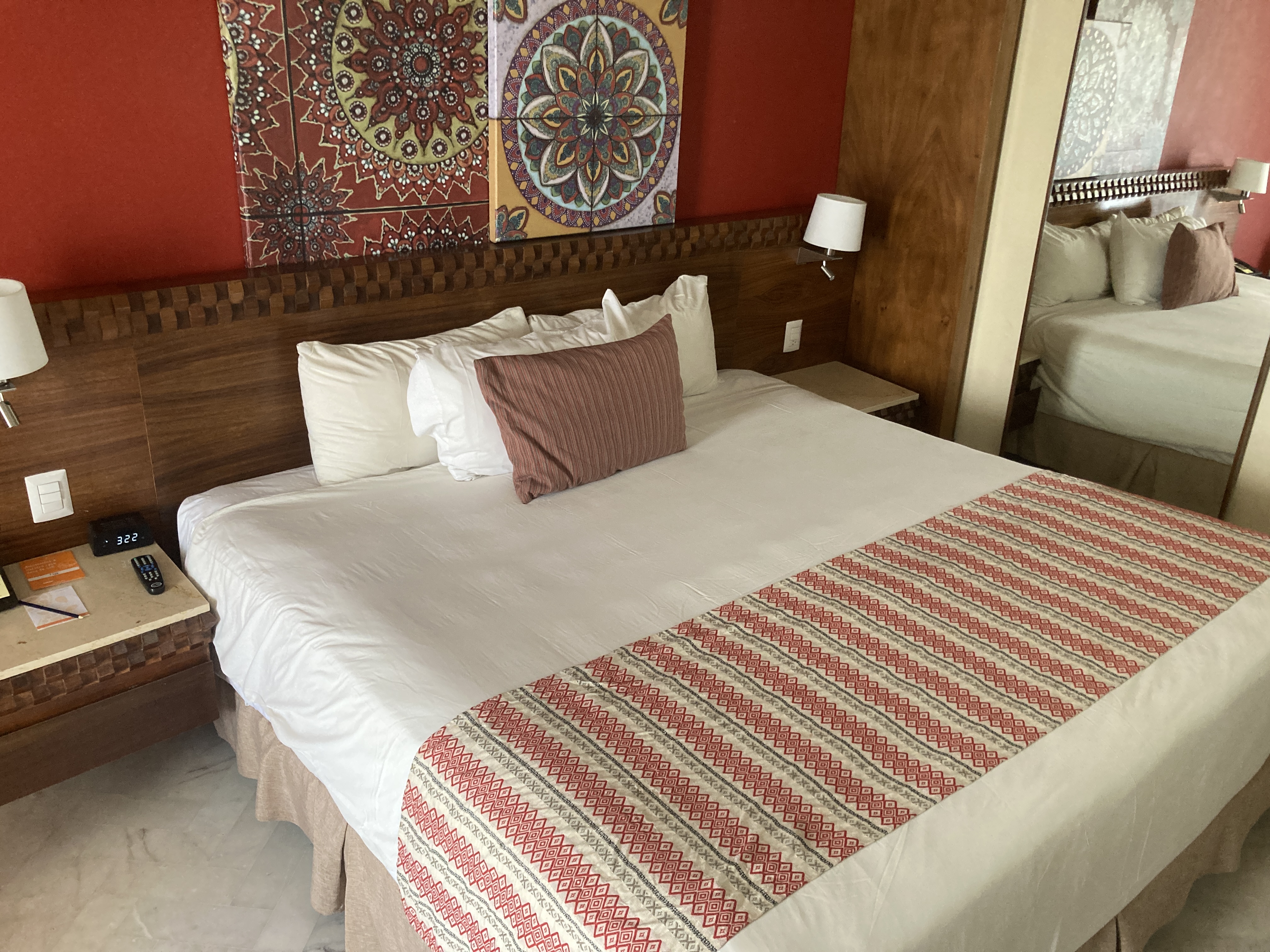 Sunscape Puerto Vallarta Resort Spa standard room bed with headboard Sunscape Puerto Vallarta Resort Spa standard room bed with headboard