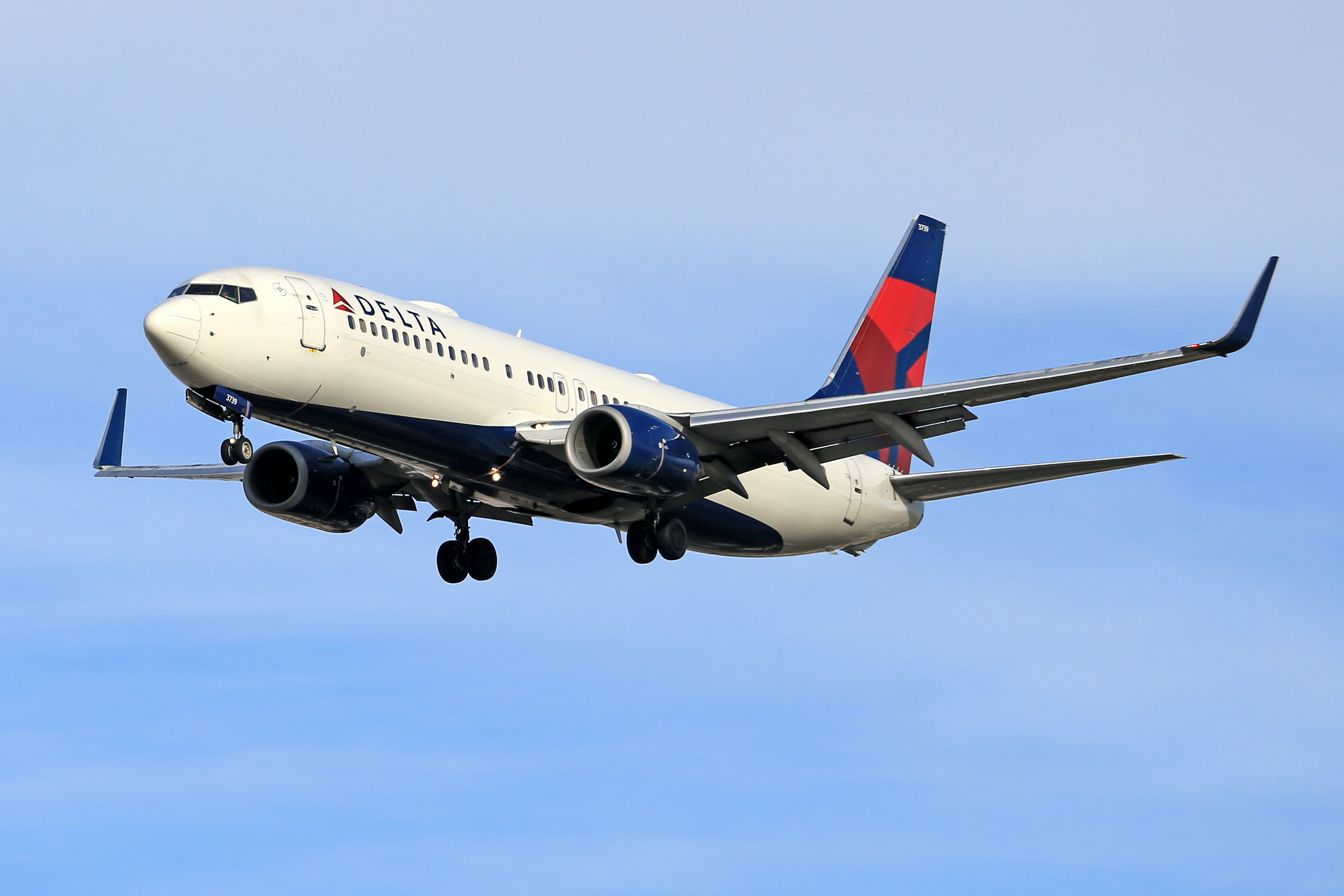 Delta Trading Cards Delta Air Lines plane in flight