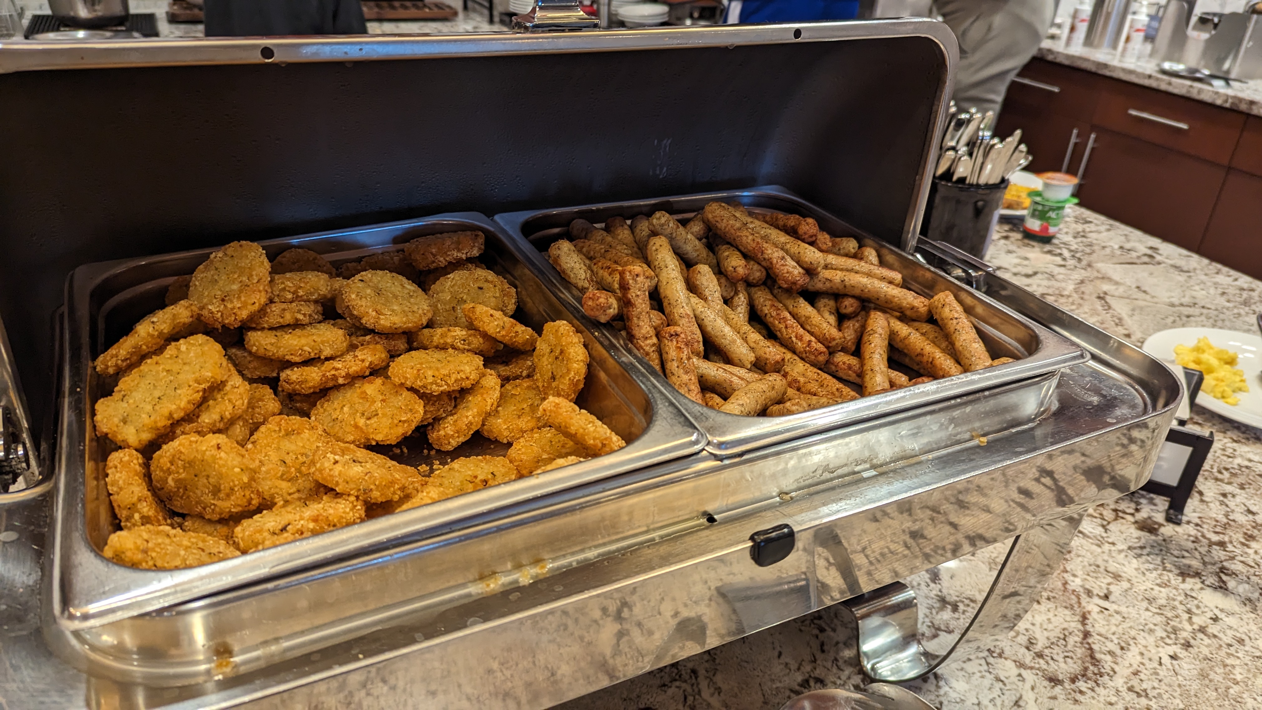 Hampton Inn Houston Downtown food and beverage breakfast sausage and potatoes