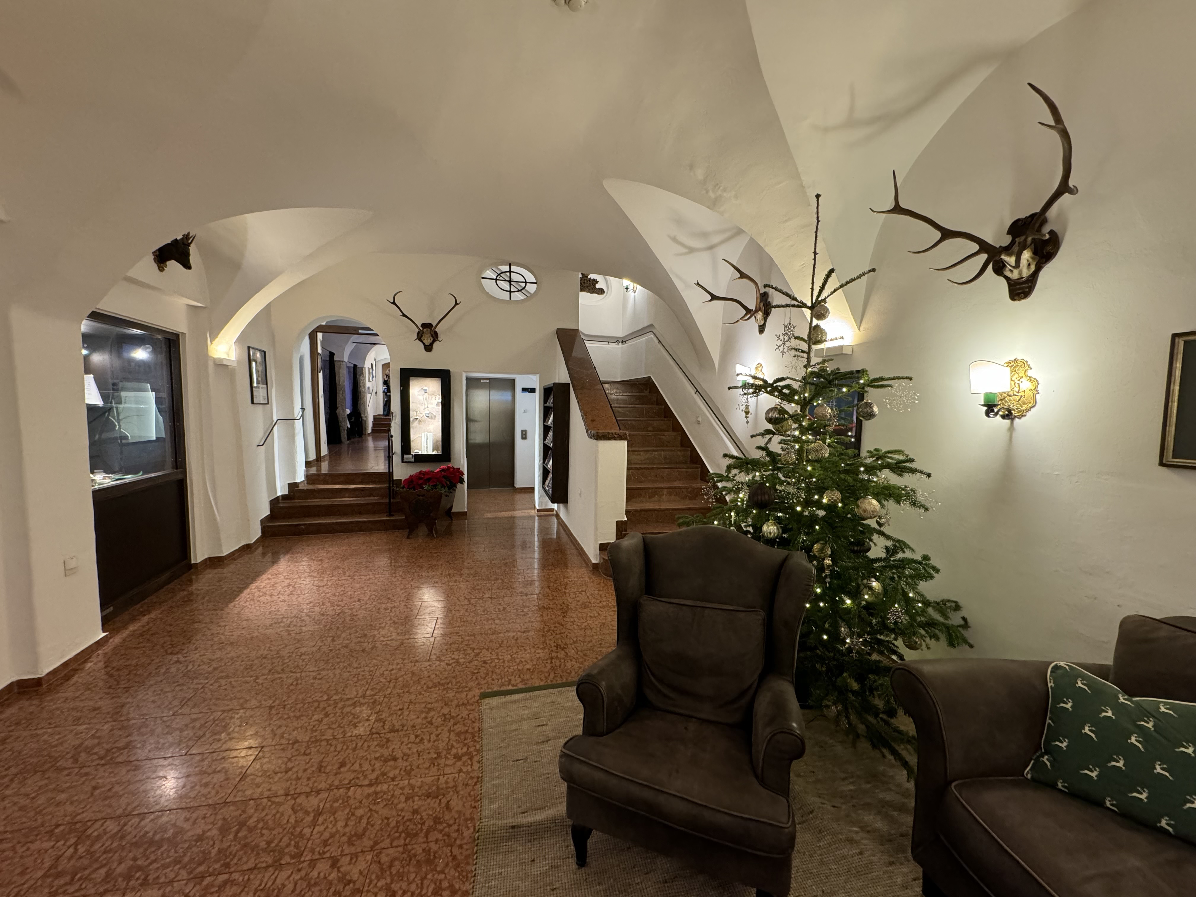 Hotel Goldener Hirsch Lobby with Tree