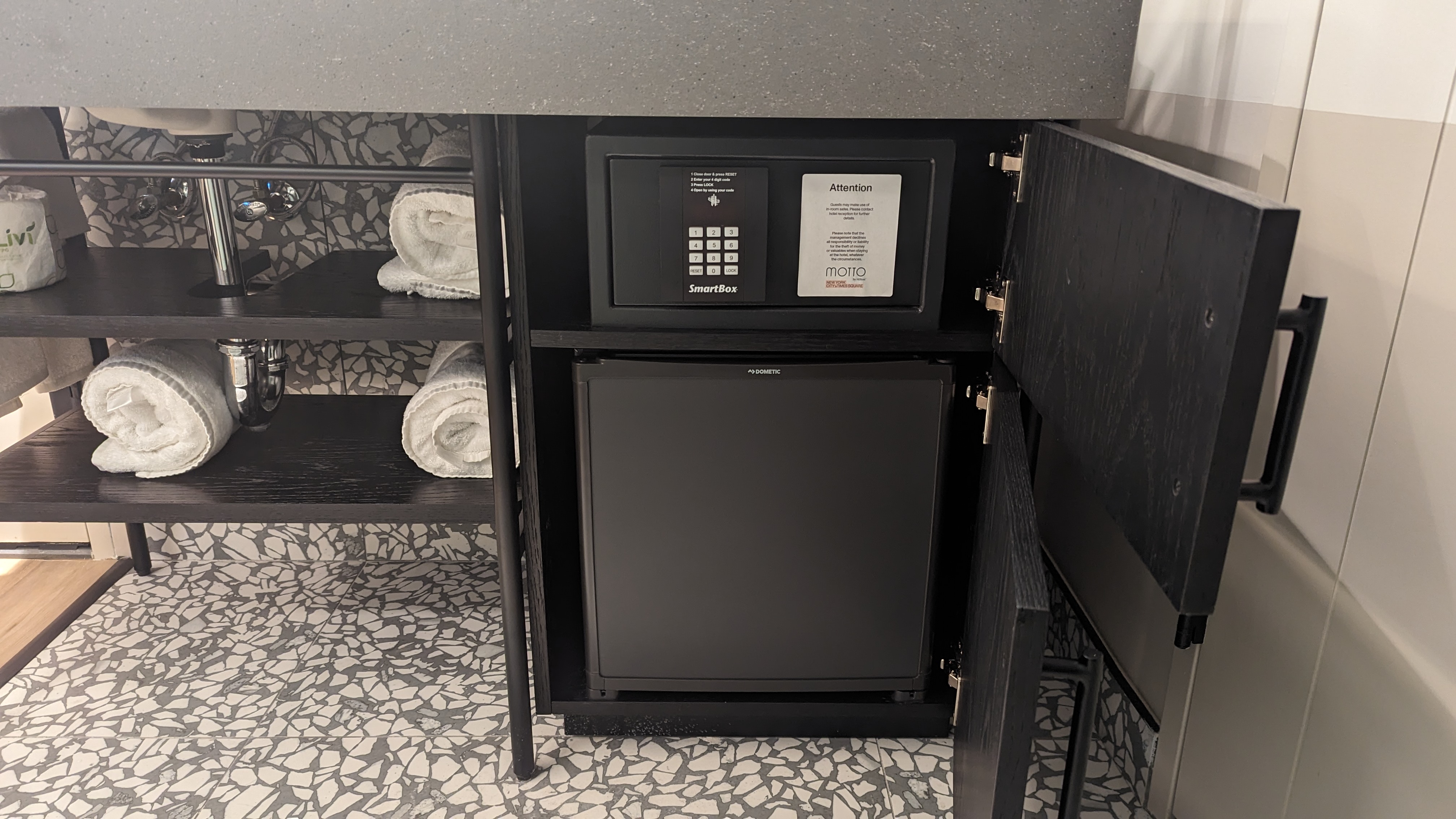 Motto by Hilton New York City Times Square guestroom bathroom fridge and safe