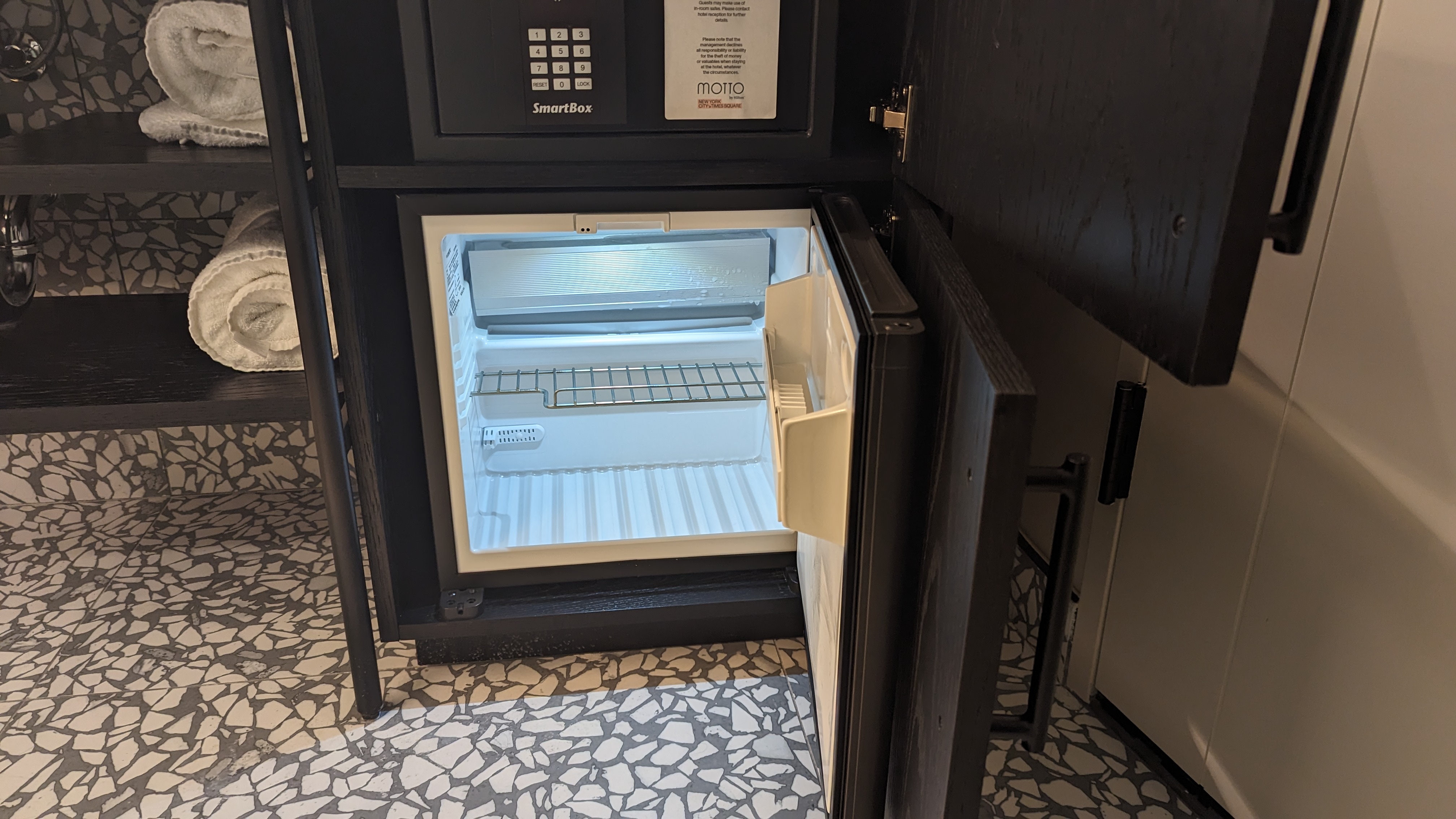 Motto by Hilton New York City Times Square guestroom bathroom fridge open