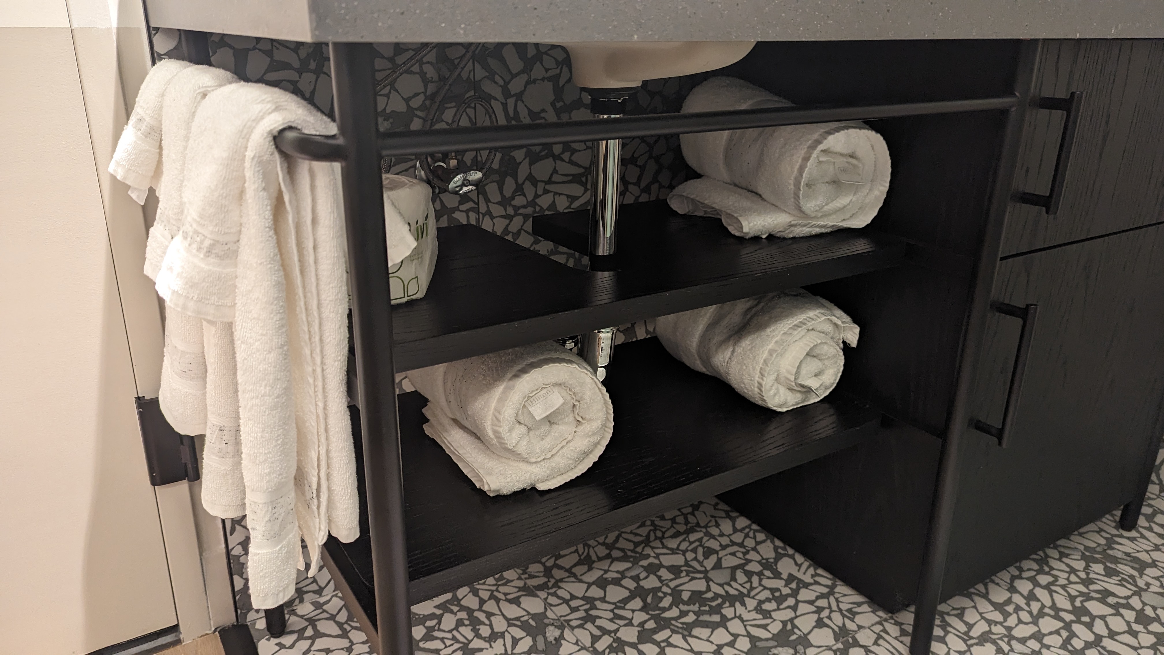 Motto by Hilton New York City Times Square guestroom bathroom towel shelves
