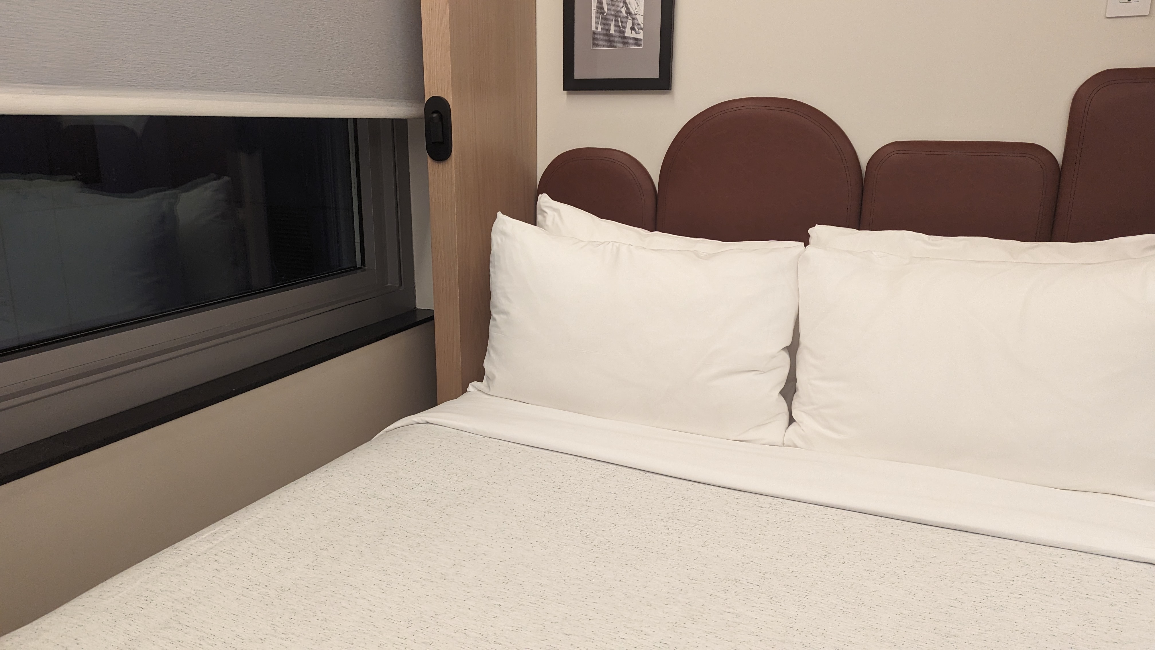 Motto by Hilton New York City Times Square guestroom bedroom window and light
